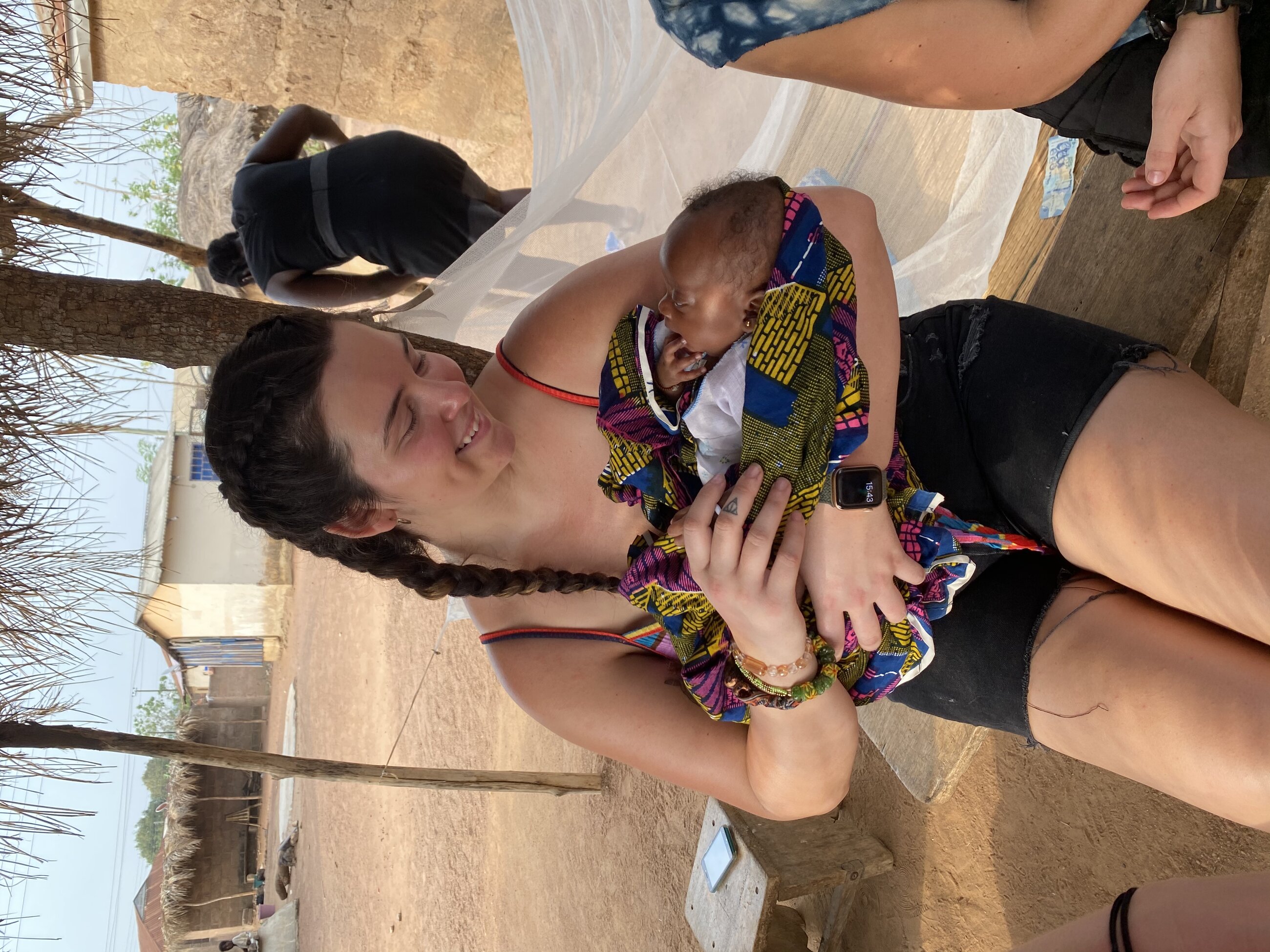 A premature twin whose mother died during childbirth. She and her sister are healthy and living with their aunt!