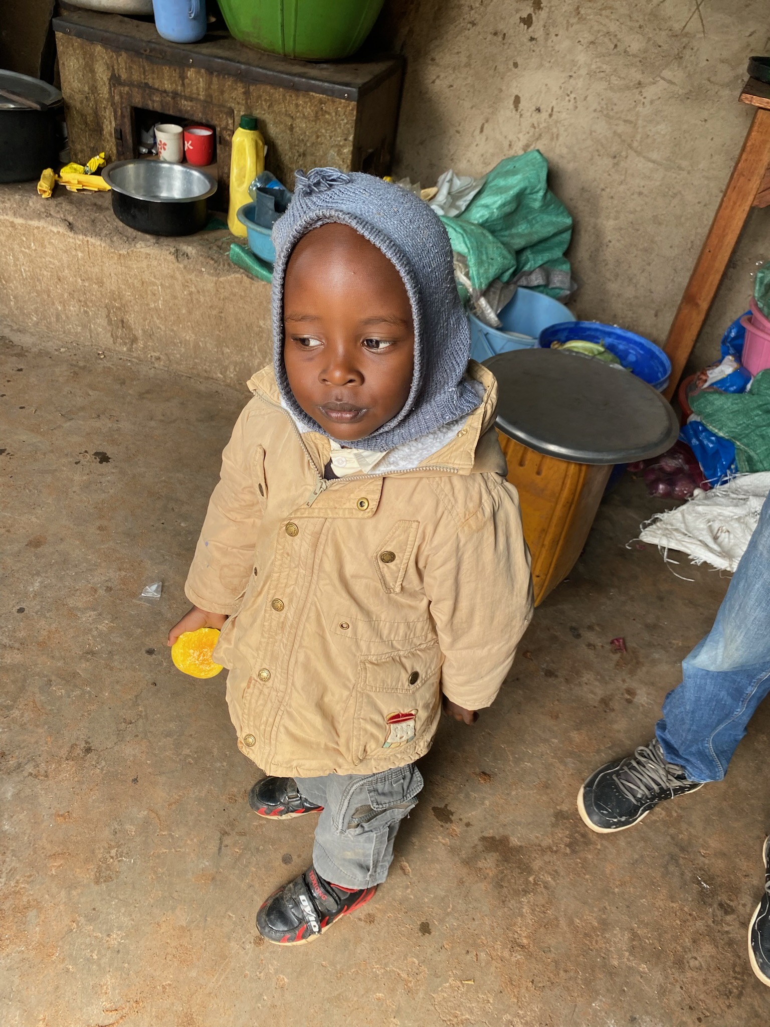 One of the children waiting for lunch