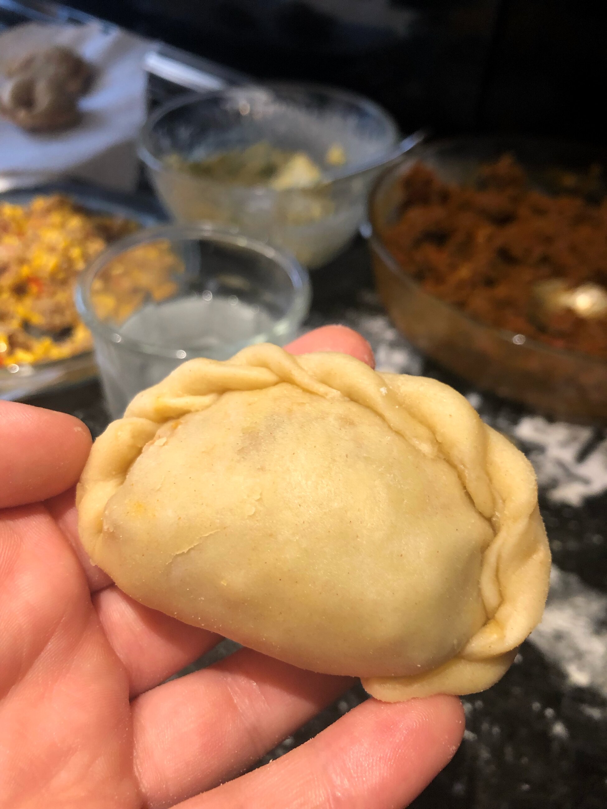 Making empanadas in a private cooking class
