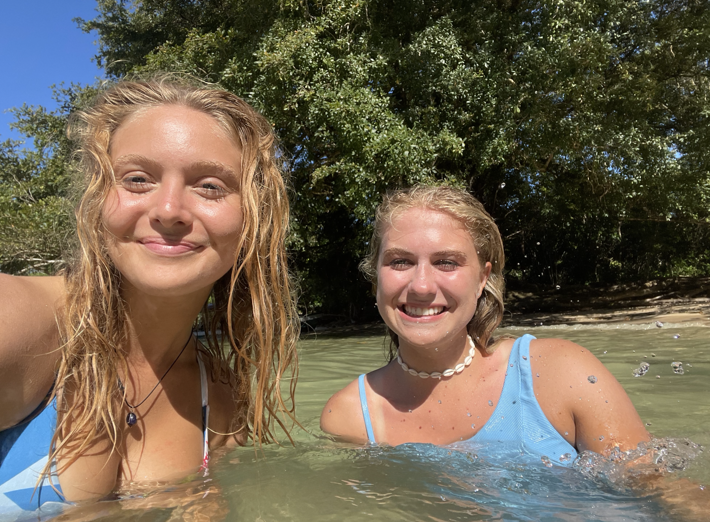 My friend and I swimming at a private cove which was a 10 minute boat ride away from our center