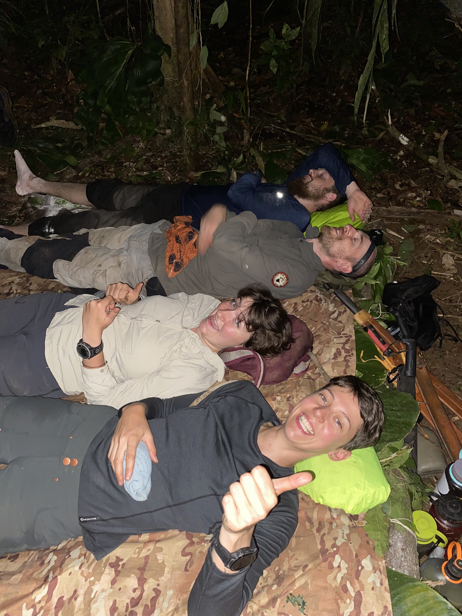 sleeping in our shelter during survival challenge