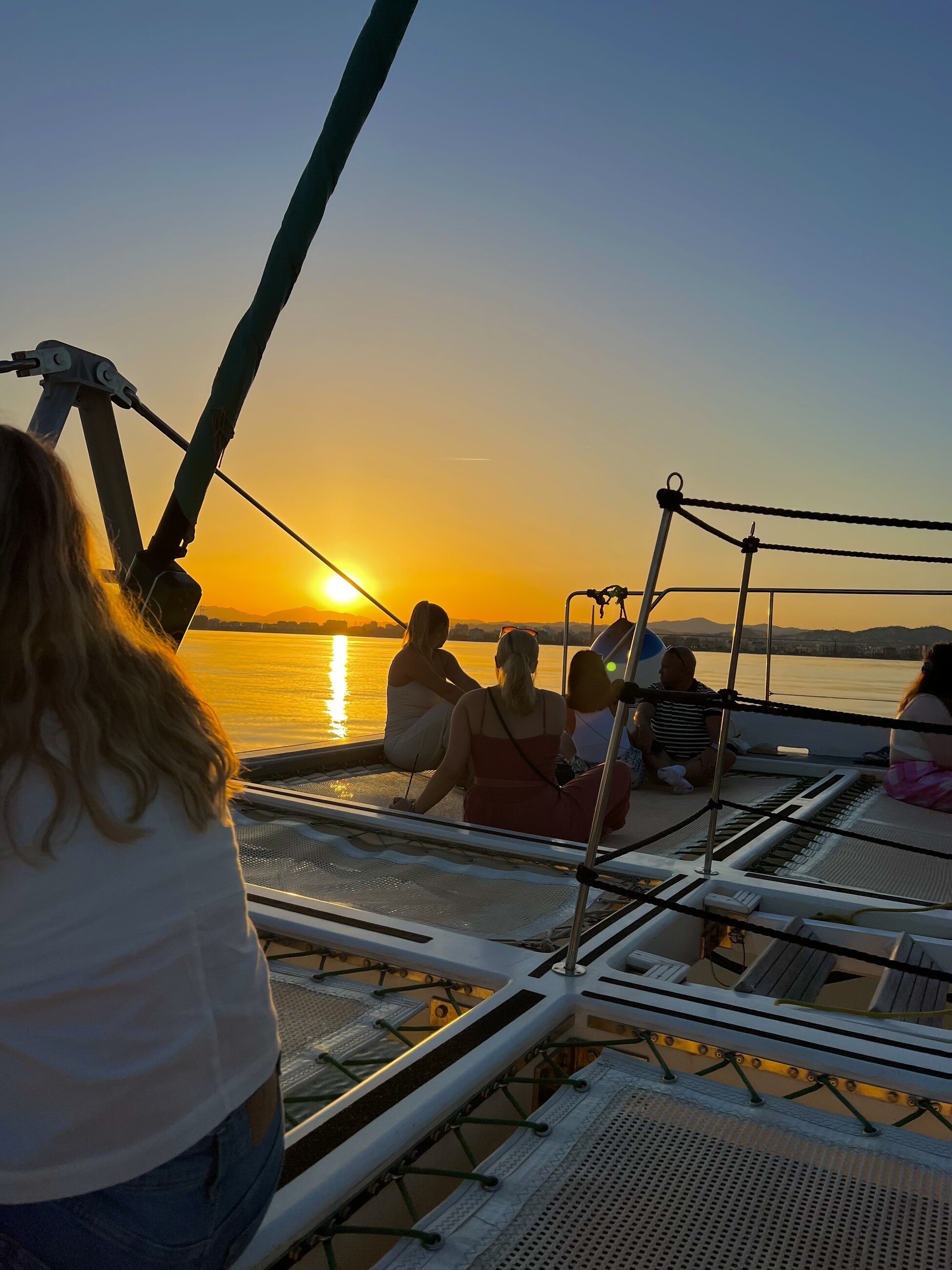Boat tour off the coast of Málaga at sunset