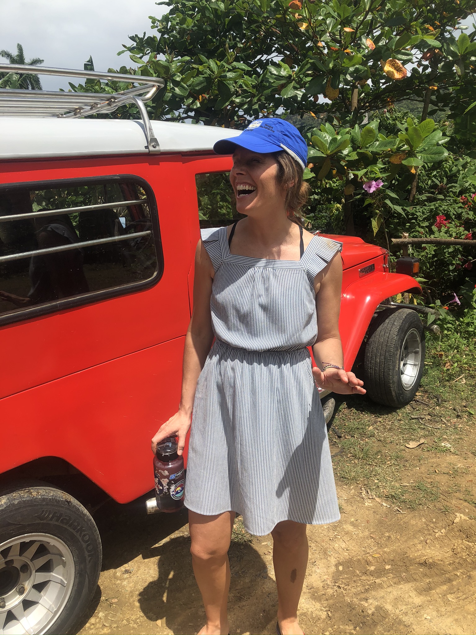 At the cacao farm, loading into the jeep