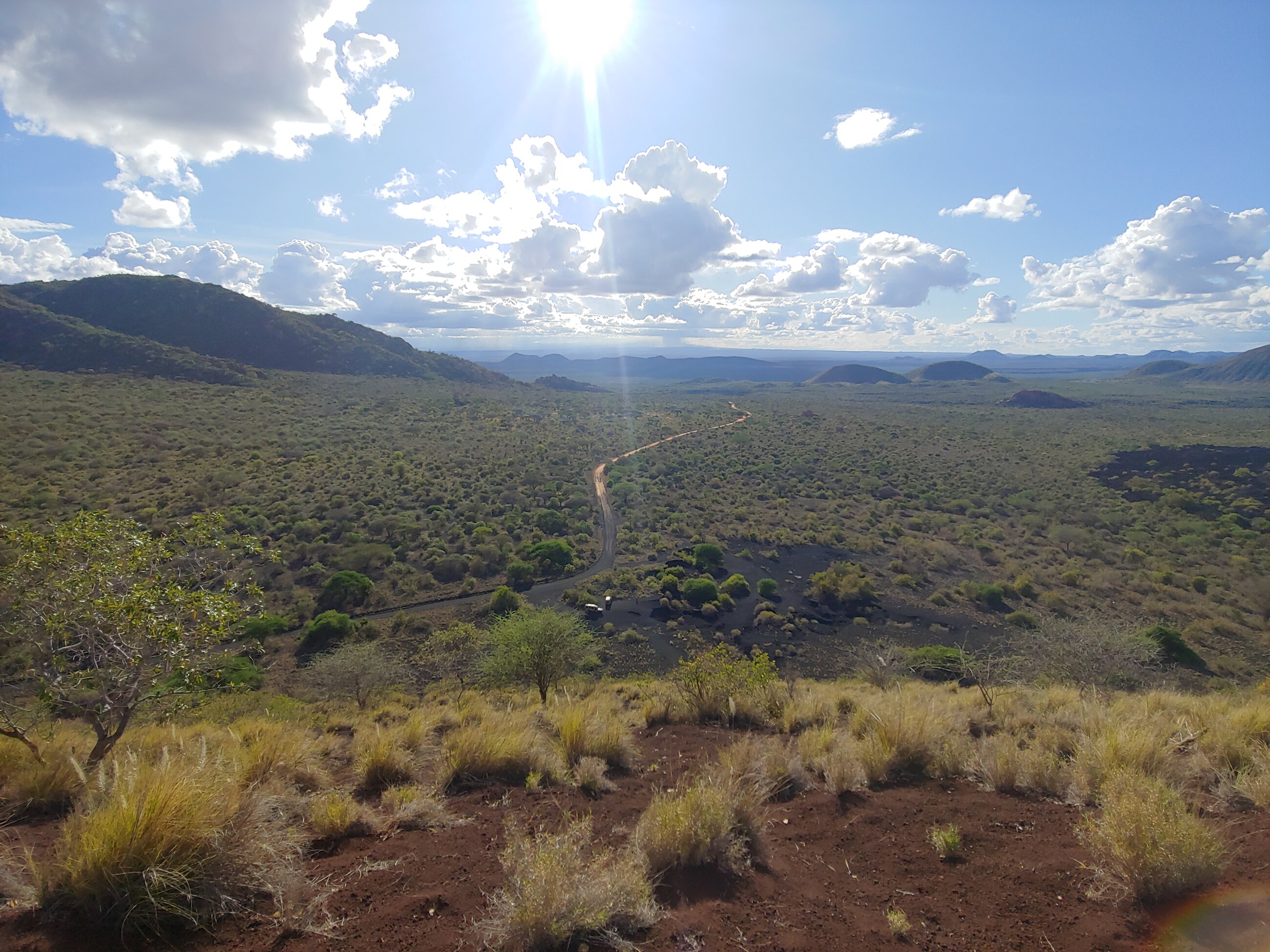 Standing on an ancient lava flow in Tsavo West National Park, Kenya