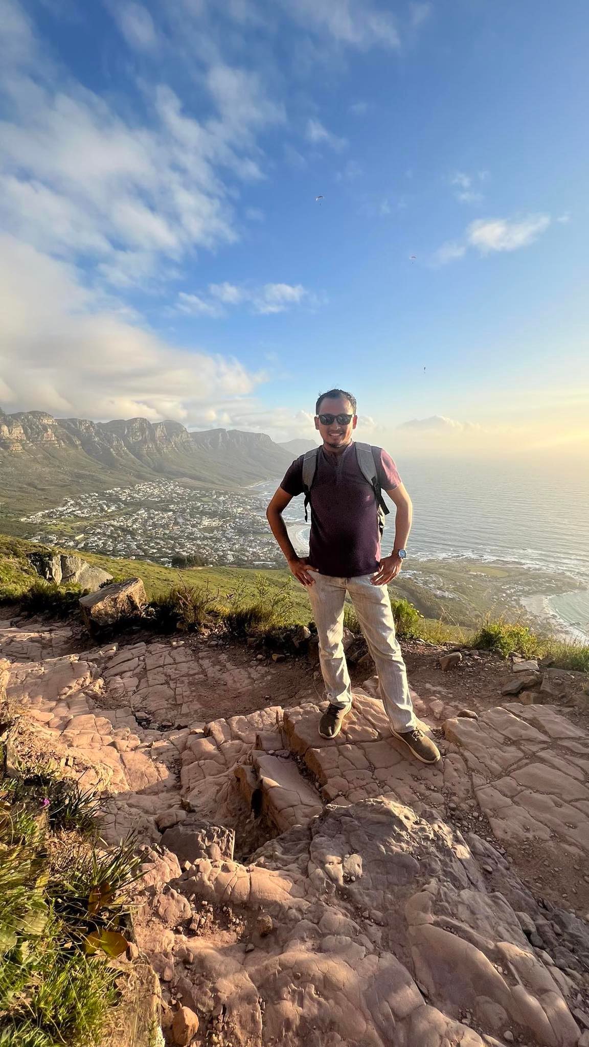 Hiking the Lion's Head with Table Mountain on the background