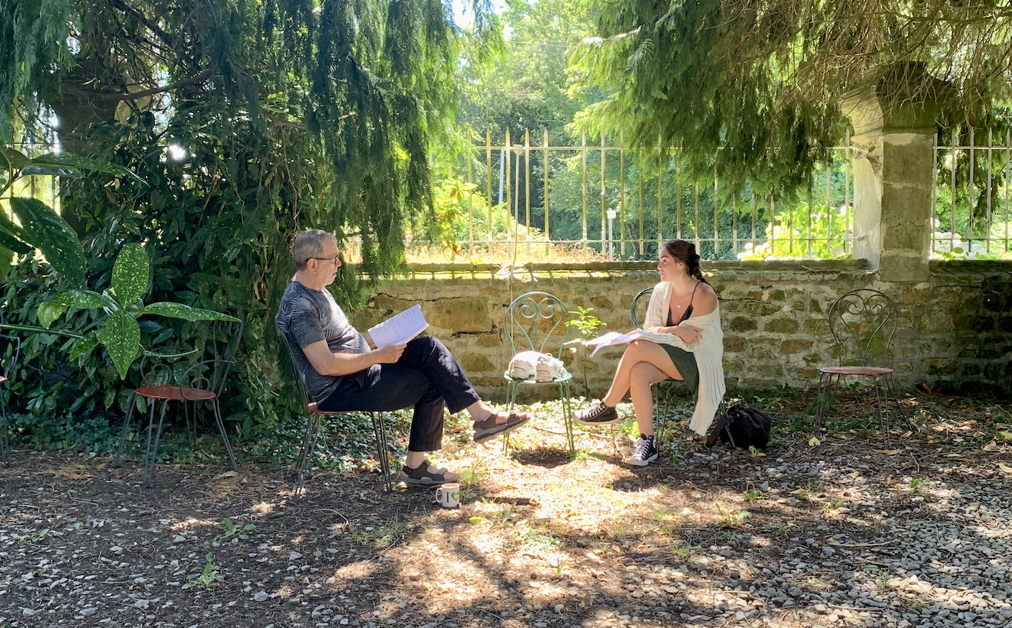 A teacher and student rehearsing lines for a short film scene.