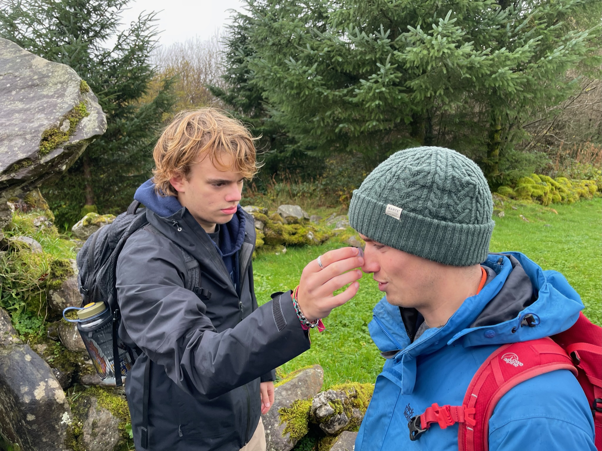 Ben blessing Niall with a magical rock