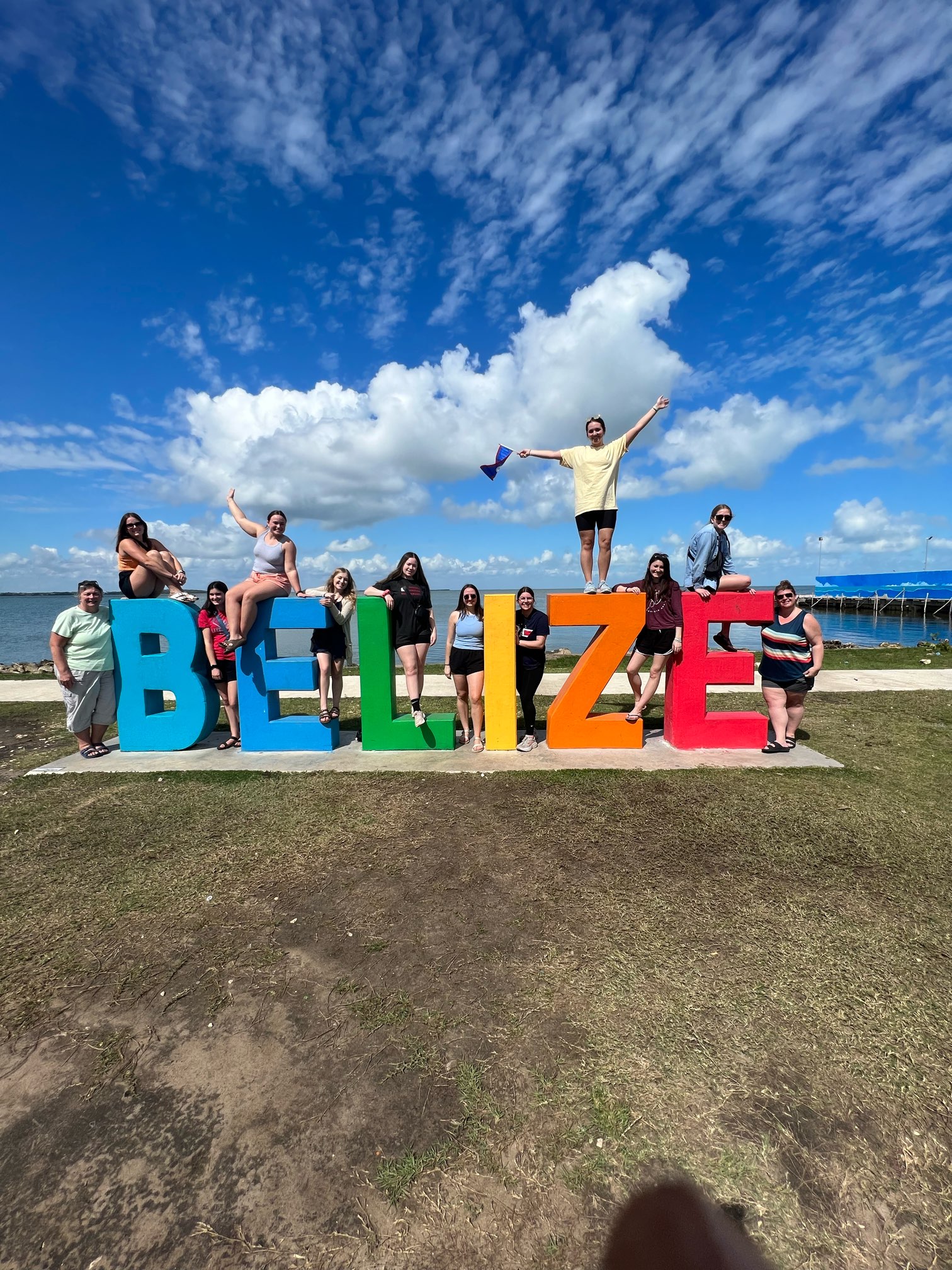 Illinois state university at the Belize sign!