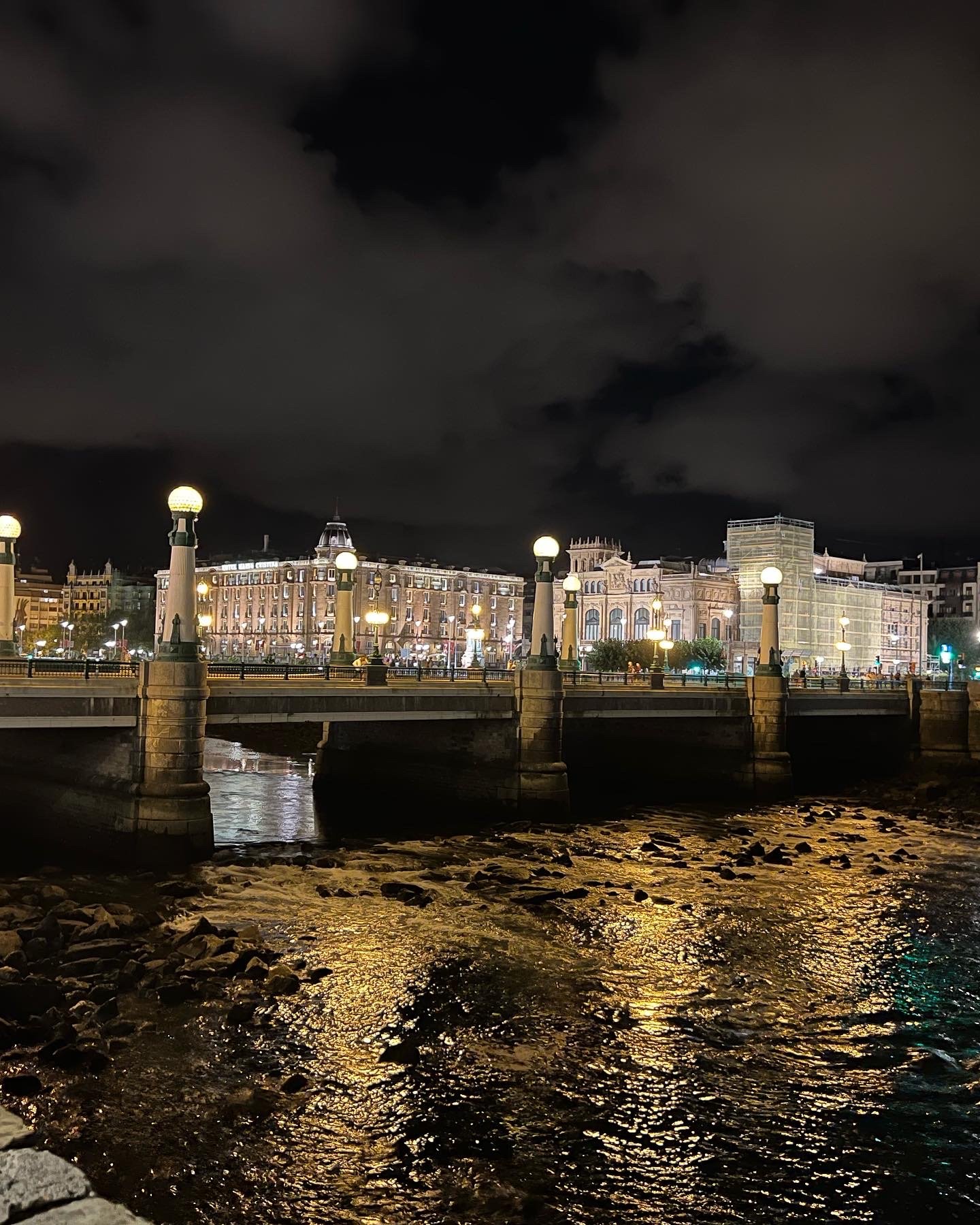 One of the bridges in San Sebastián lit up by the night lights!