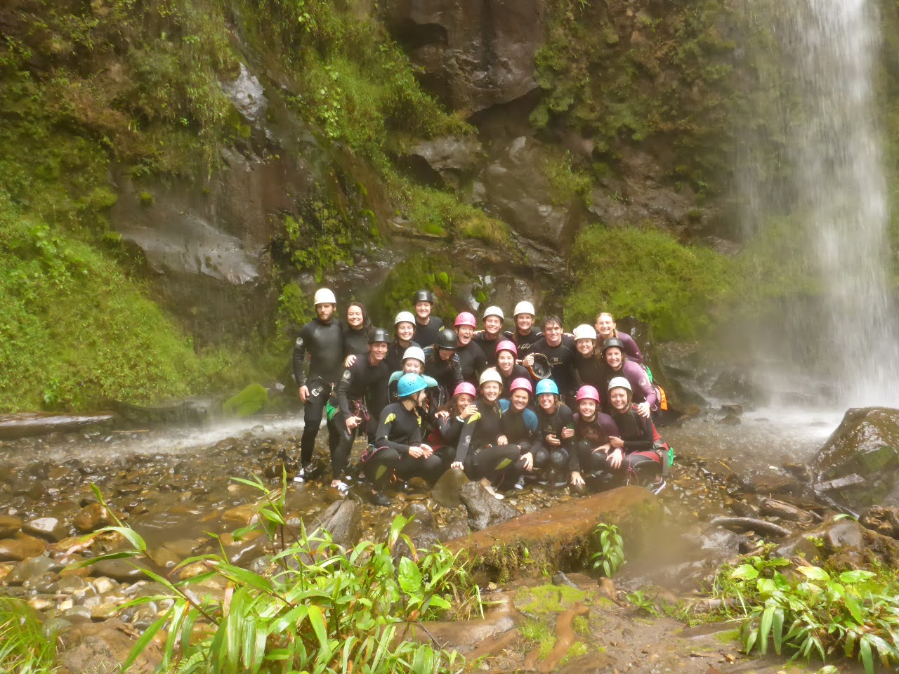 Repelling down waterfalls in Banos!