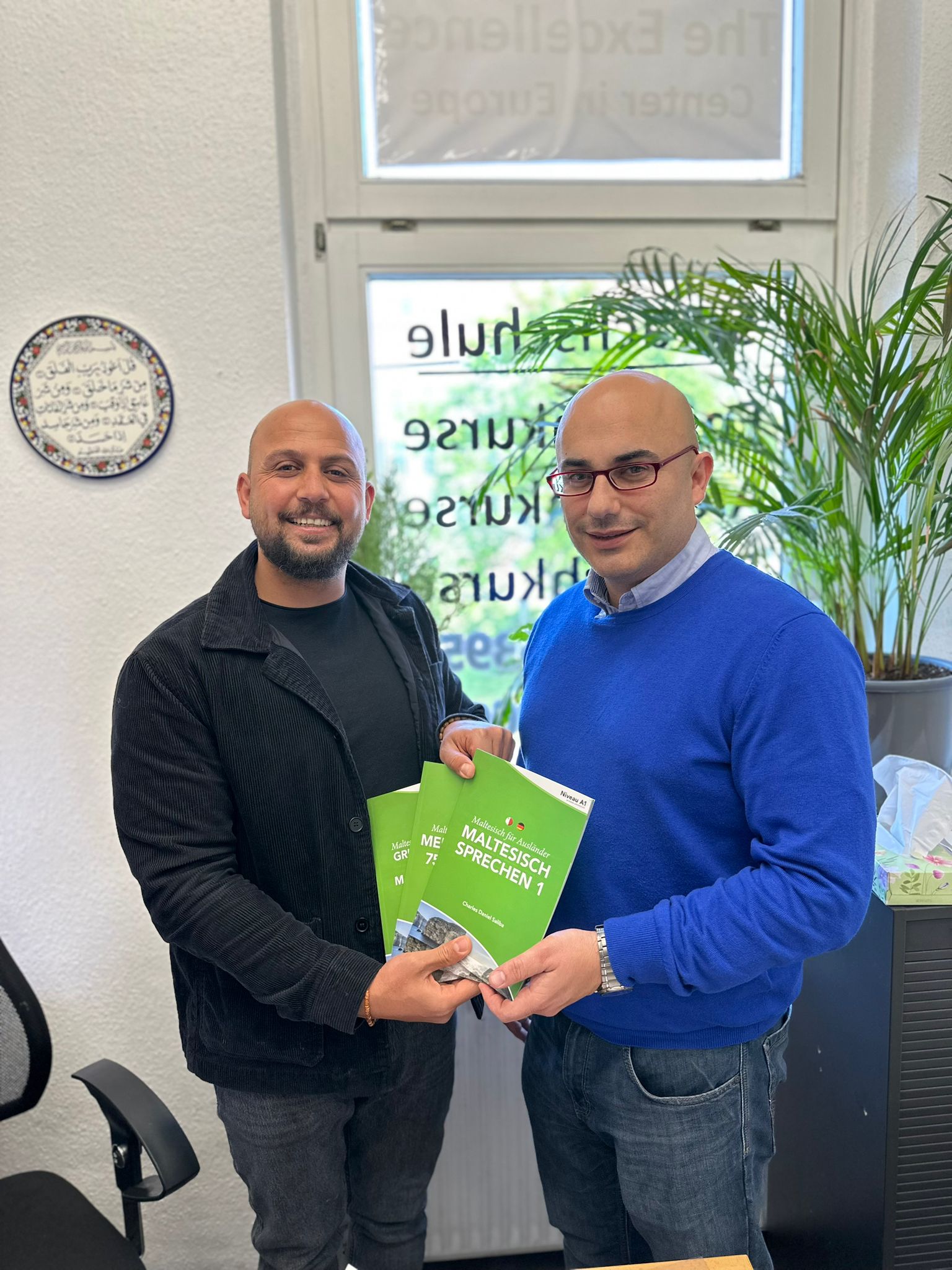 Presenting the Maltesisch für Ausländer series to the Head of the Institute