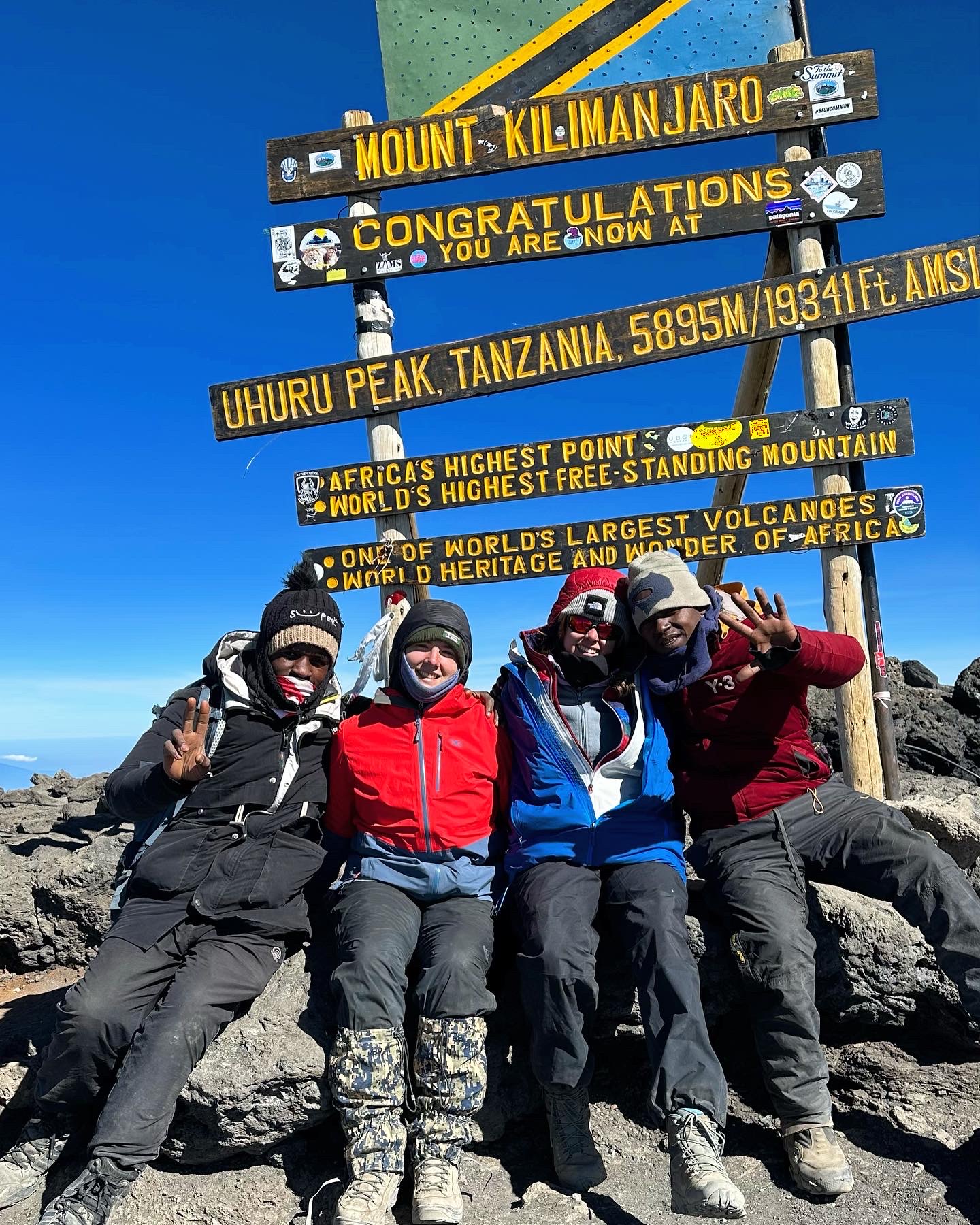 Uhuru peak with my green paw guides 