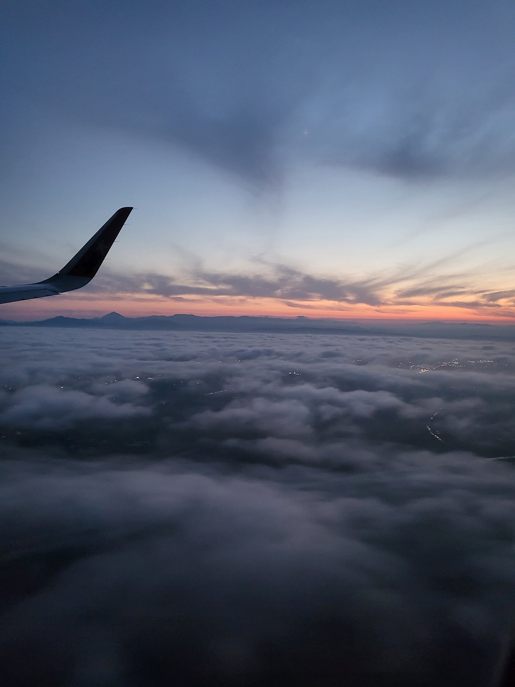 Sunset coming into Sapporo