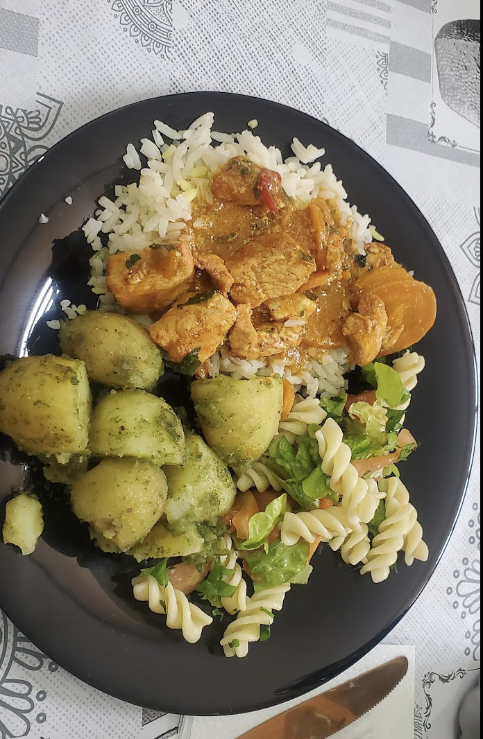 An example of food on the trip: this meal consisted of rice, chicken, potatoes, and pasta salad