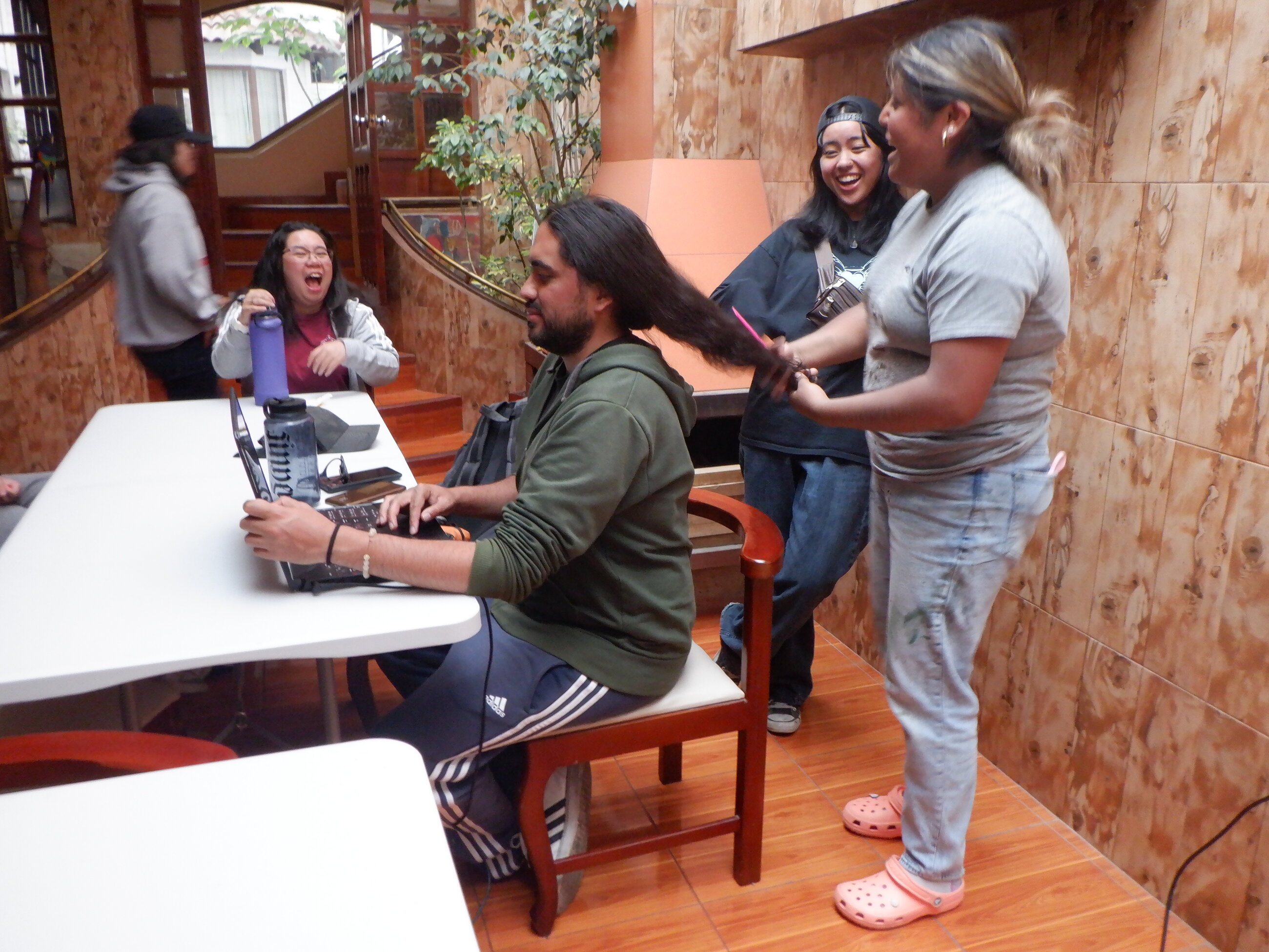 My friends and I braiding our PC, Paco’s hair