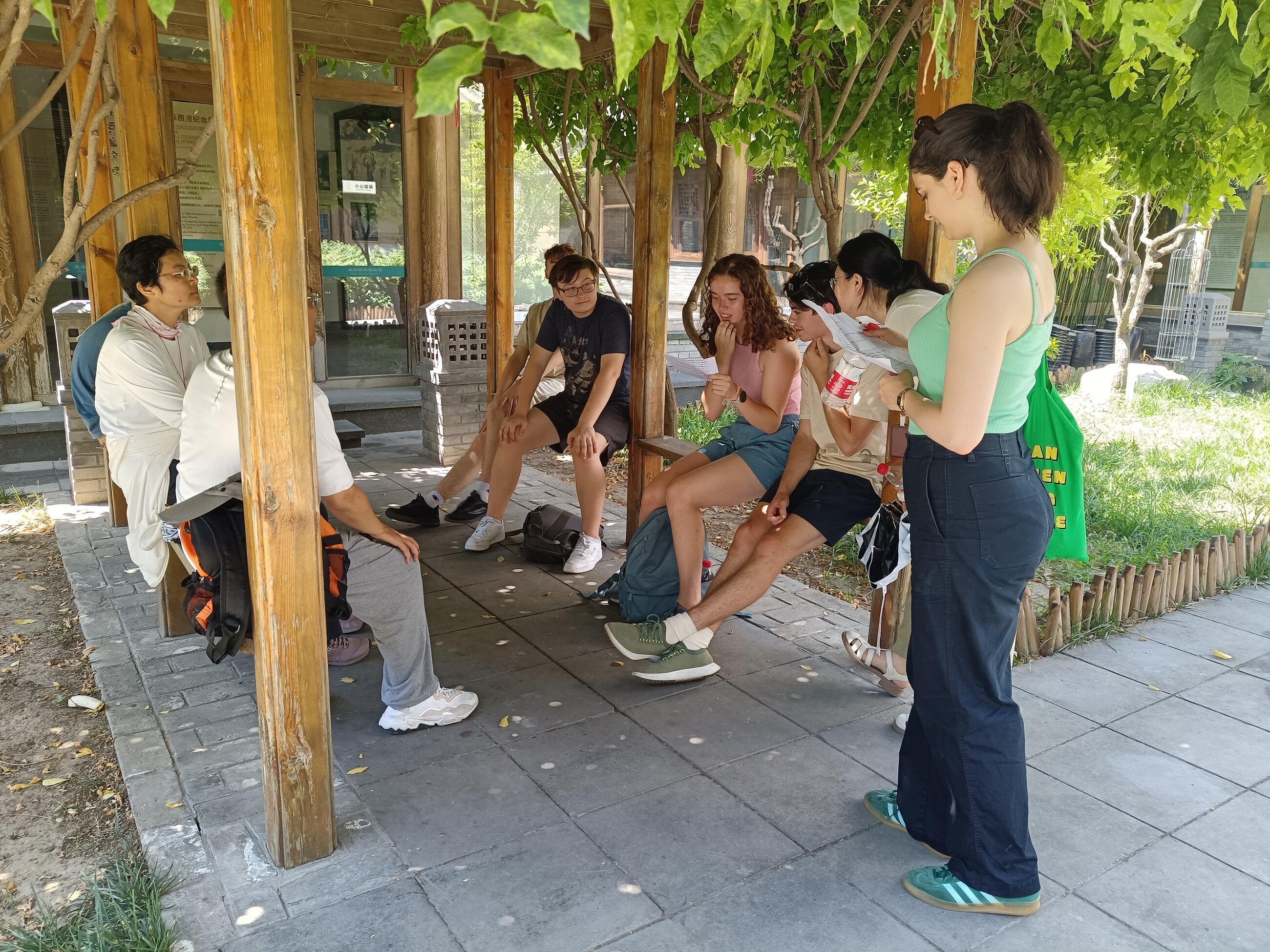 Talking with tourists from Taiwan in a hutong museum in Beijing