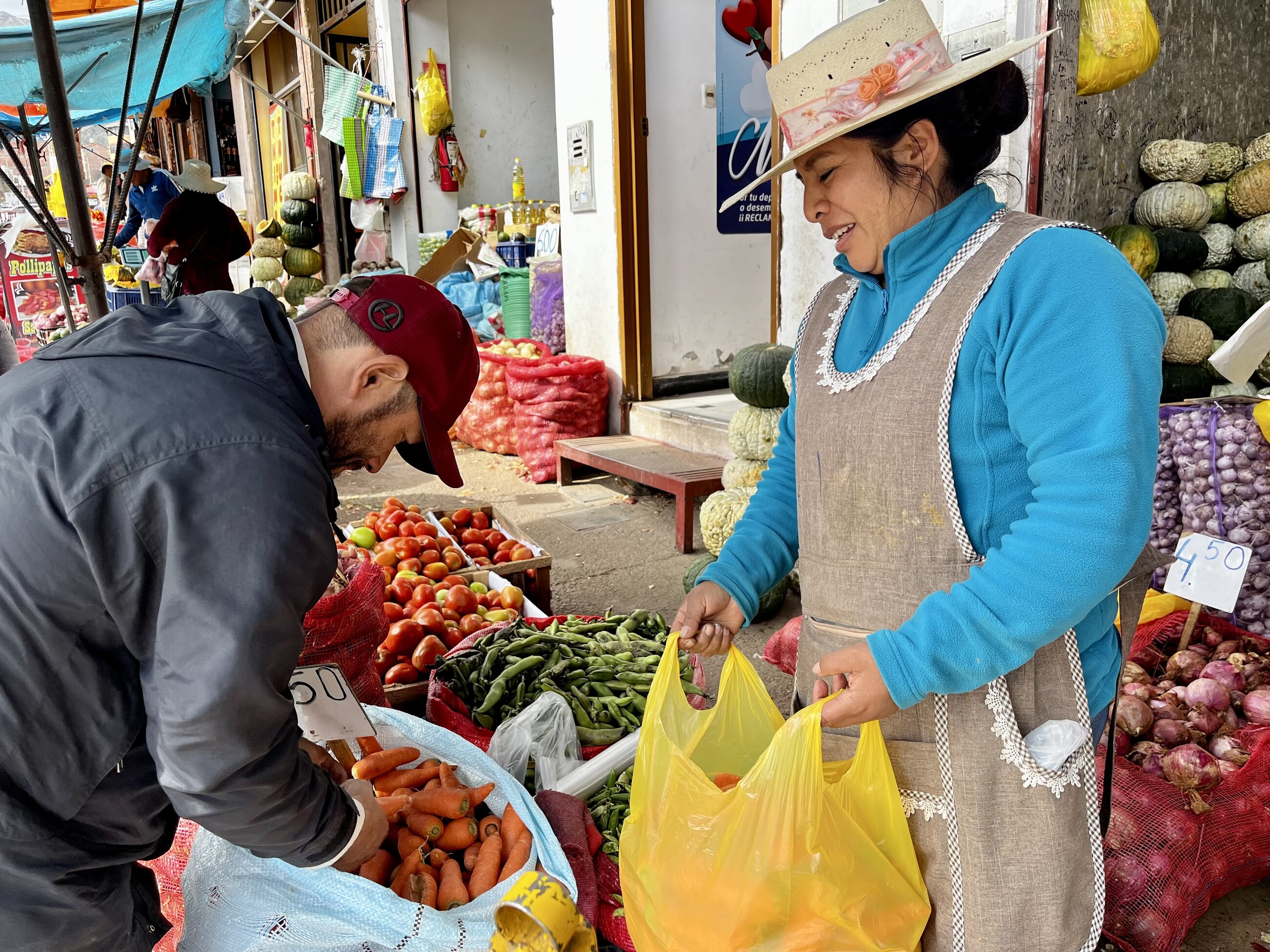 buying food for the orphanage with our Global Coordinator, Roger