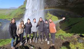 Standing under a waterfall