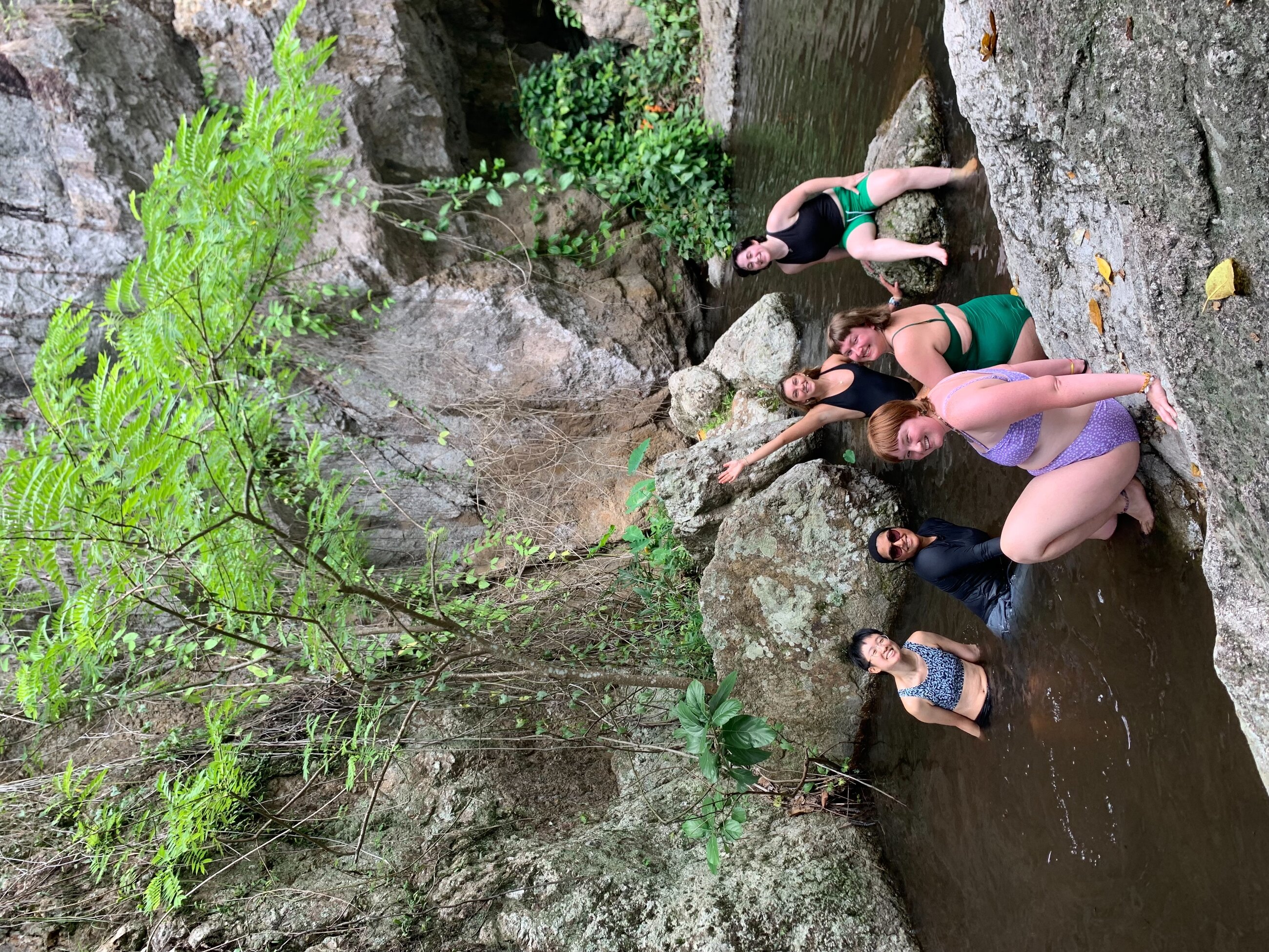 Group of my closest friends and I at a waterfall near Chiang Mai