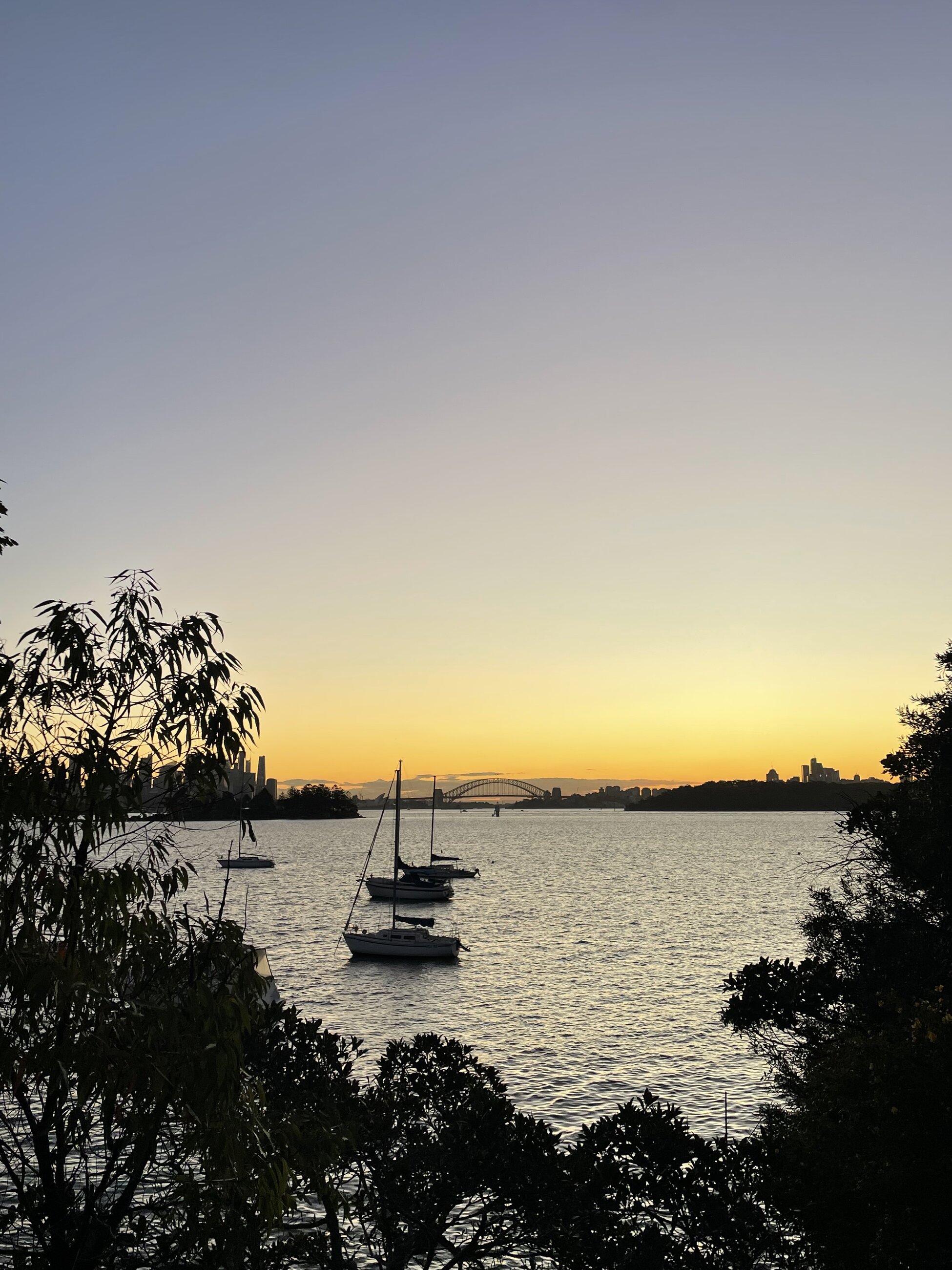 Views of the Harbour Bridge at Sunset from North Bondi Beach 