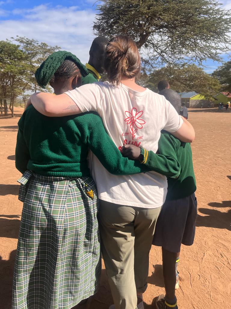 One of the other volunteers caught this picture of me with a couple of the kids when we were on our break! 