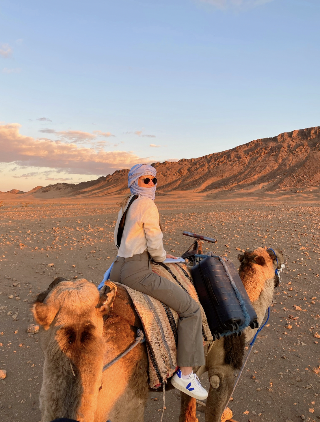 Riding camels in the Sahara!