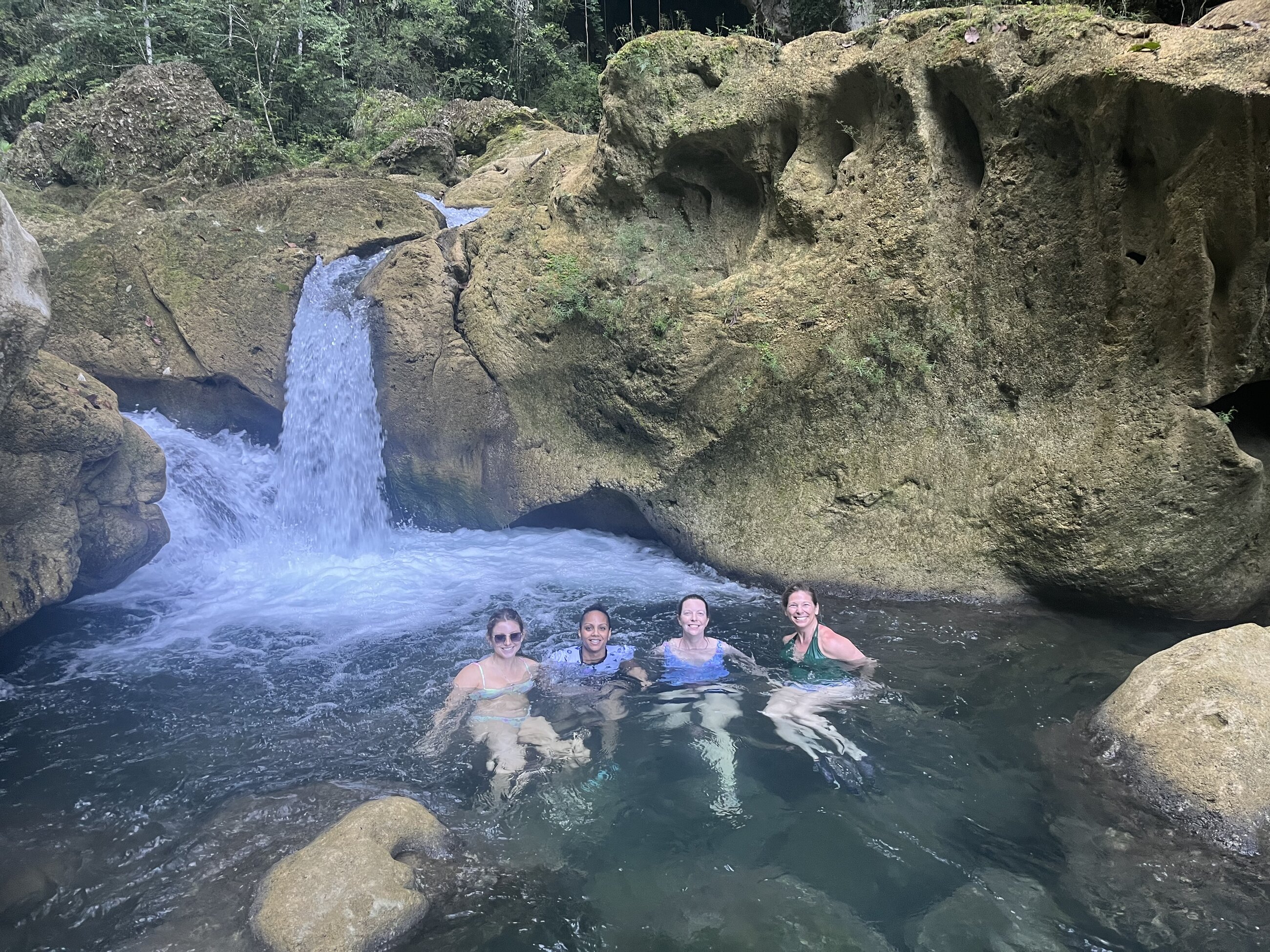 Swimming in the Blue Creek cave swimming hole. 