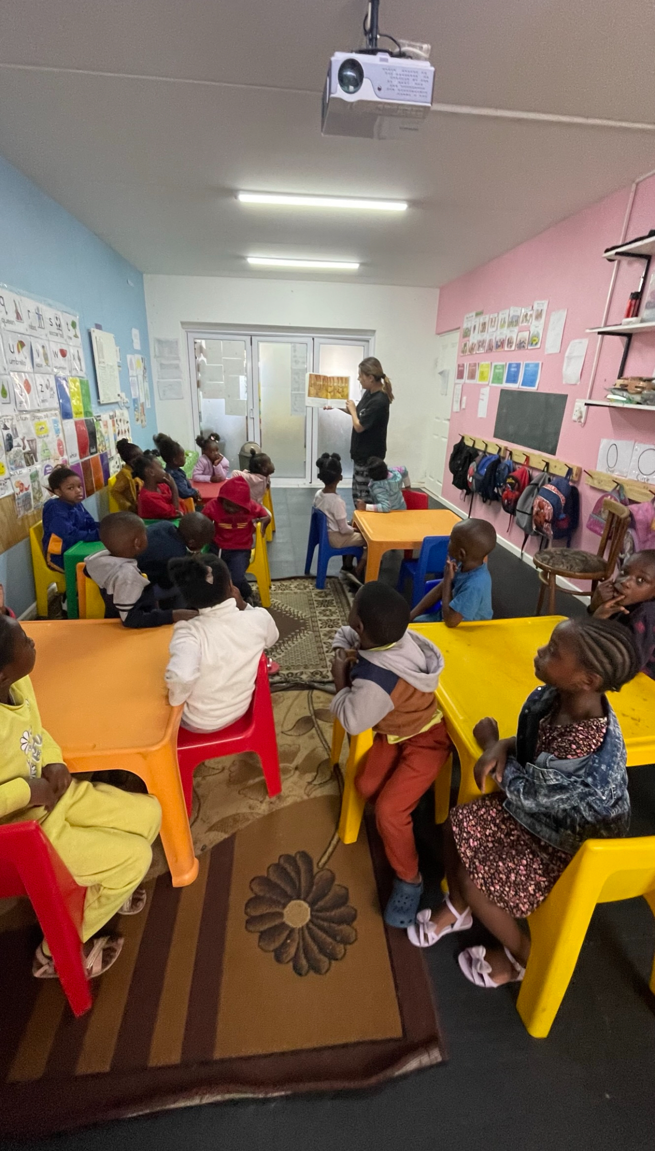 Reading a book to one of the classes at the school I volunteered at!