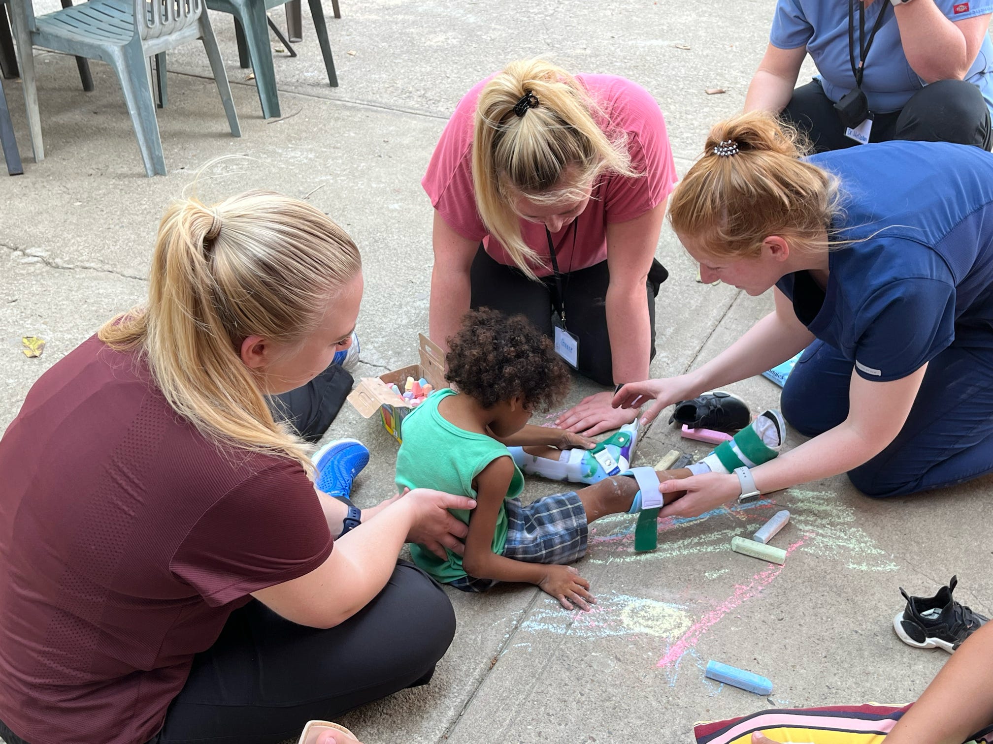 HPU DPT students with pediatric patient