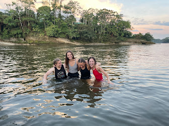 Swimming in a tributary of the Amazon River with some of my now best friends