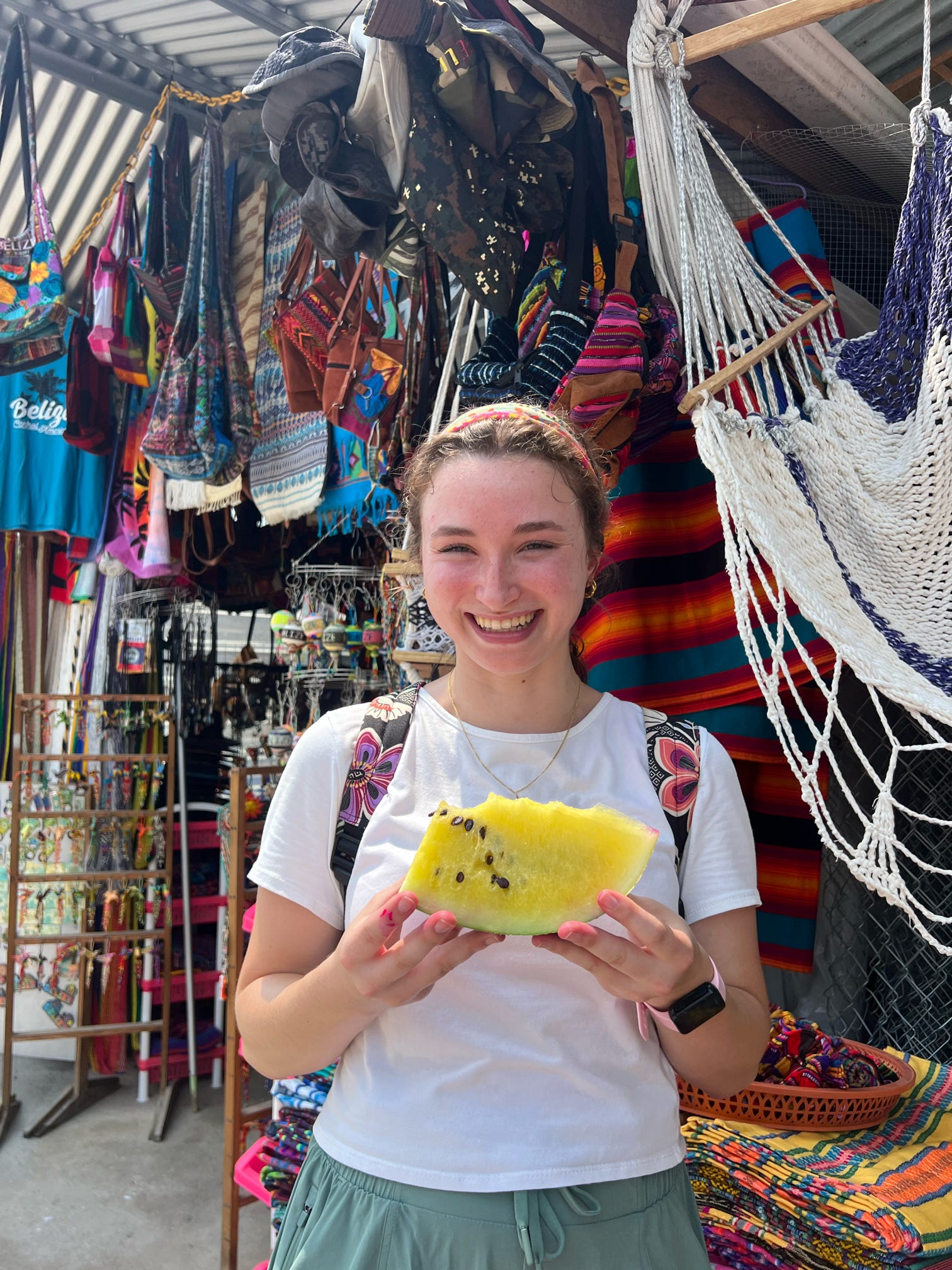 Me in the market trying yellow watermelon for the first time! 