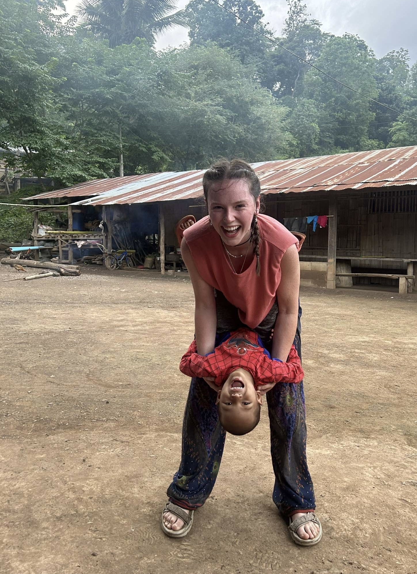 A beautiful local child of the Lahu village and I playing around
