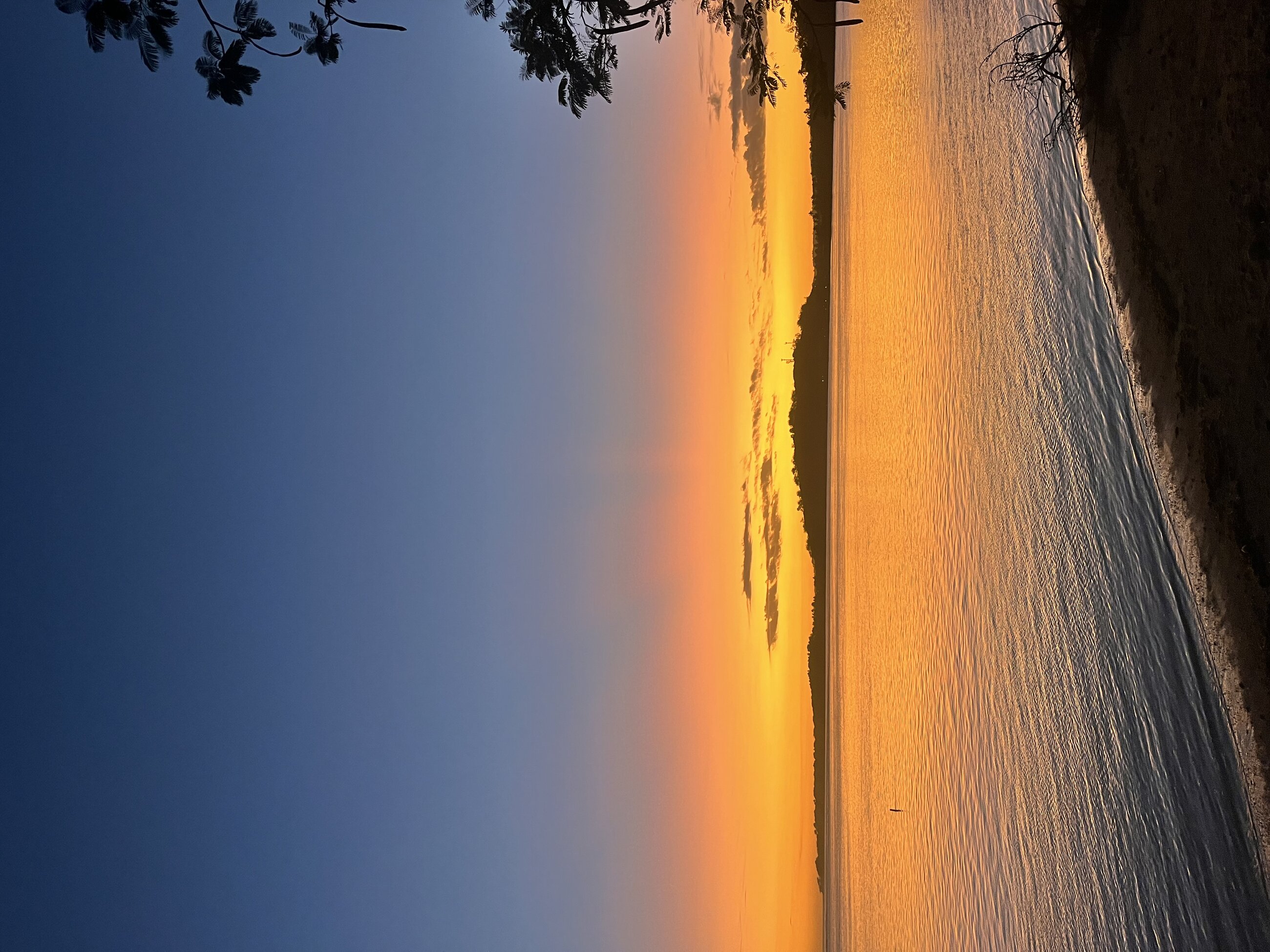 Sunsets across from the volunteer house