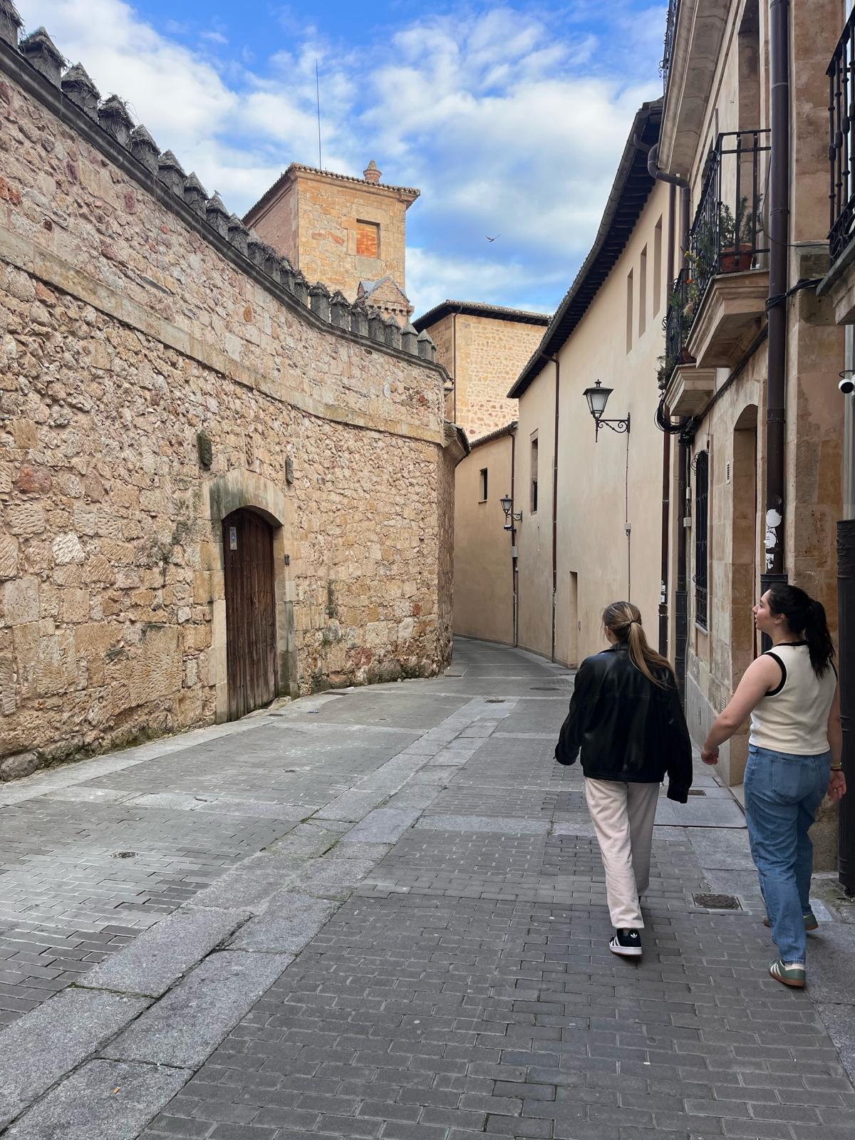 walking through the sandstone buildings
