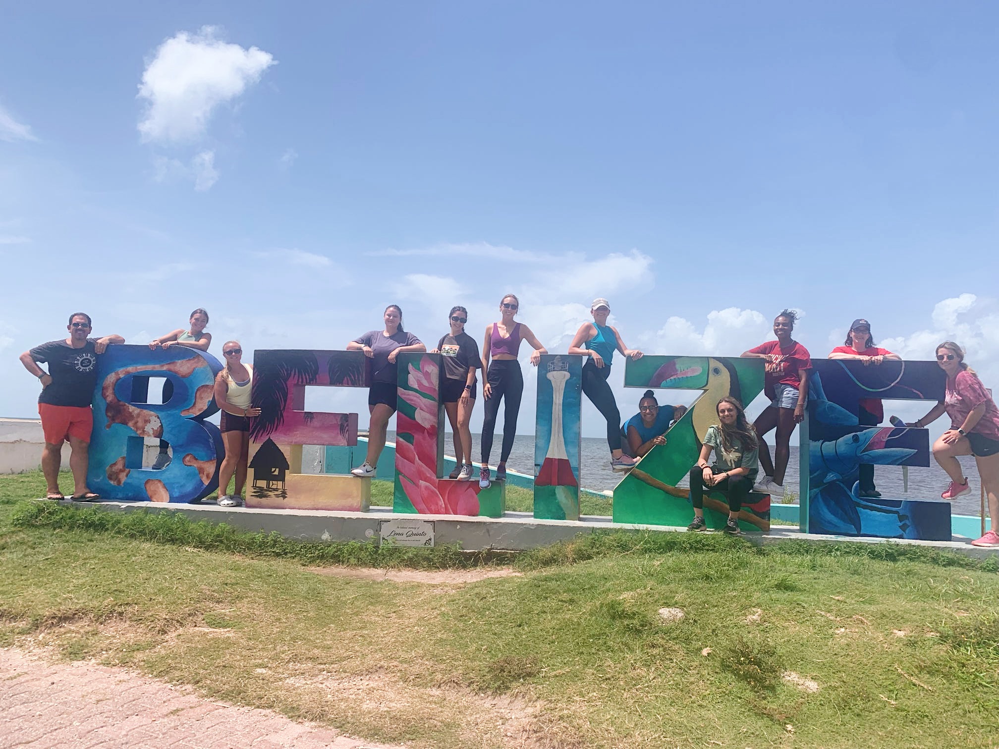 Group photo by the Belize sign 