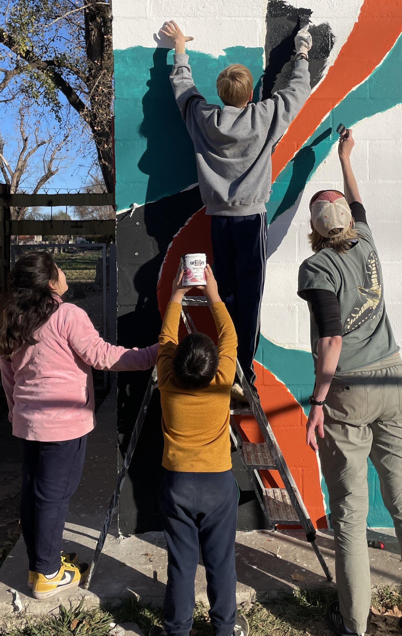 Helpers with mural