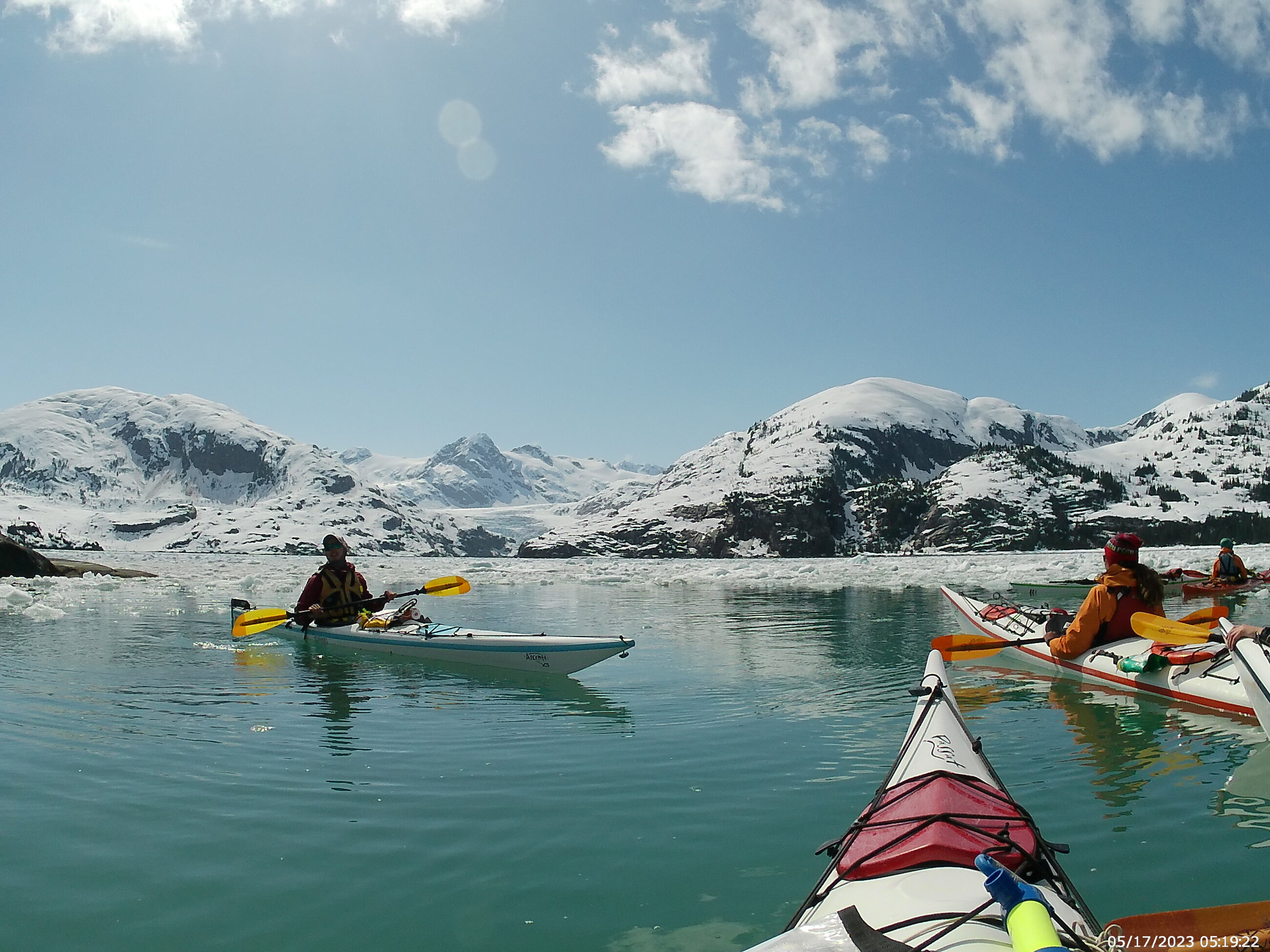 Kayaking by a glacier