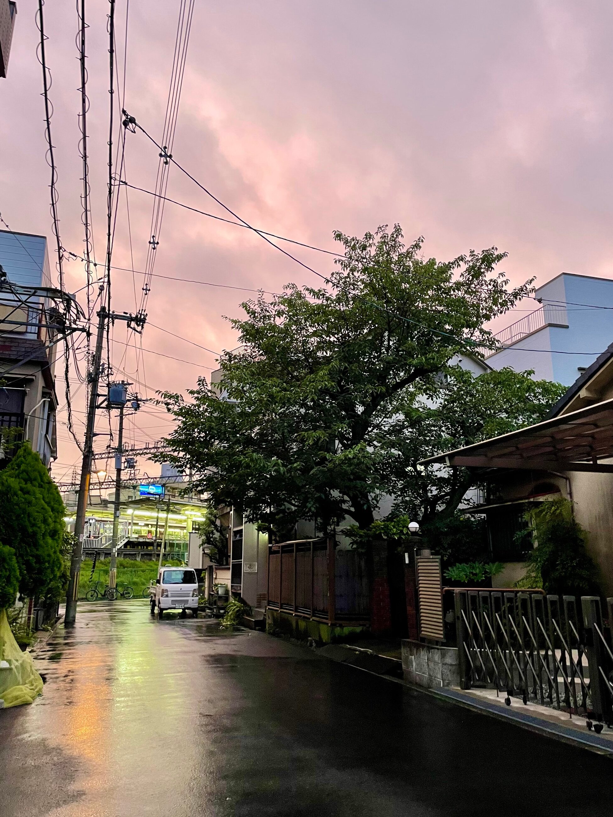 The street outside of my apartment after it rains. Osaka skies turn purple after it rains and it's beautiful 😍