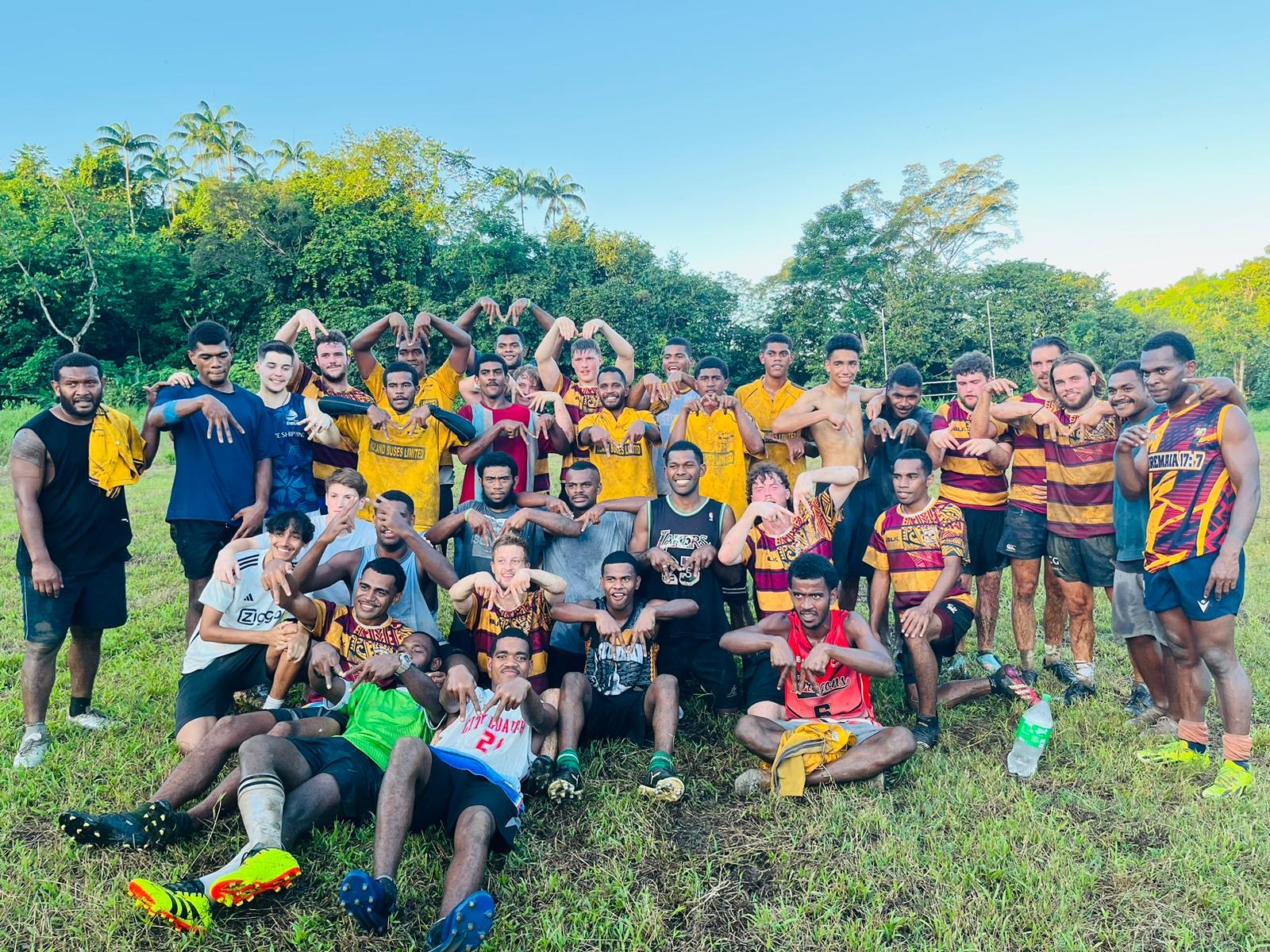 After a game of rugby with the Fijian locals