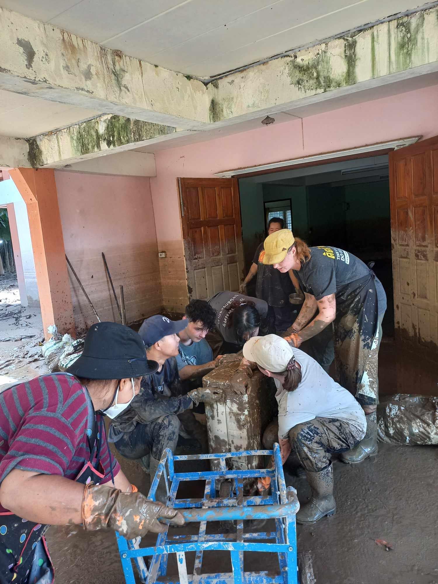 Cleaning out flooded basement of the animal shelter