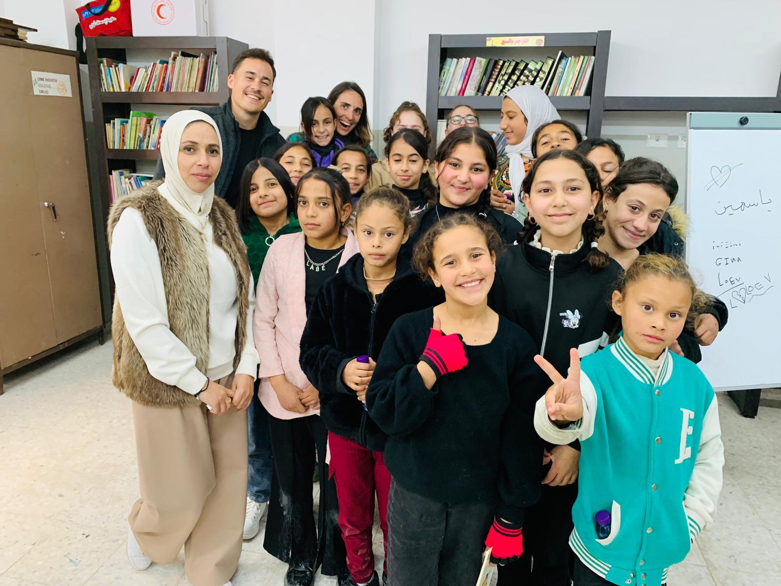 With the kids from Al Fawar