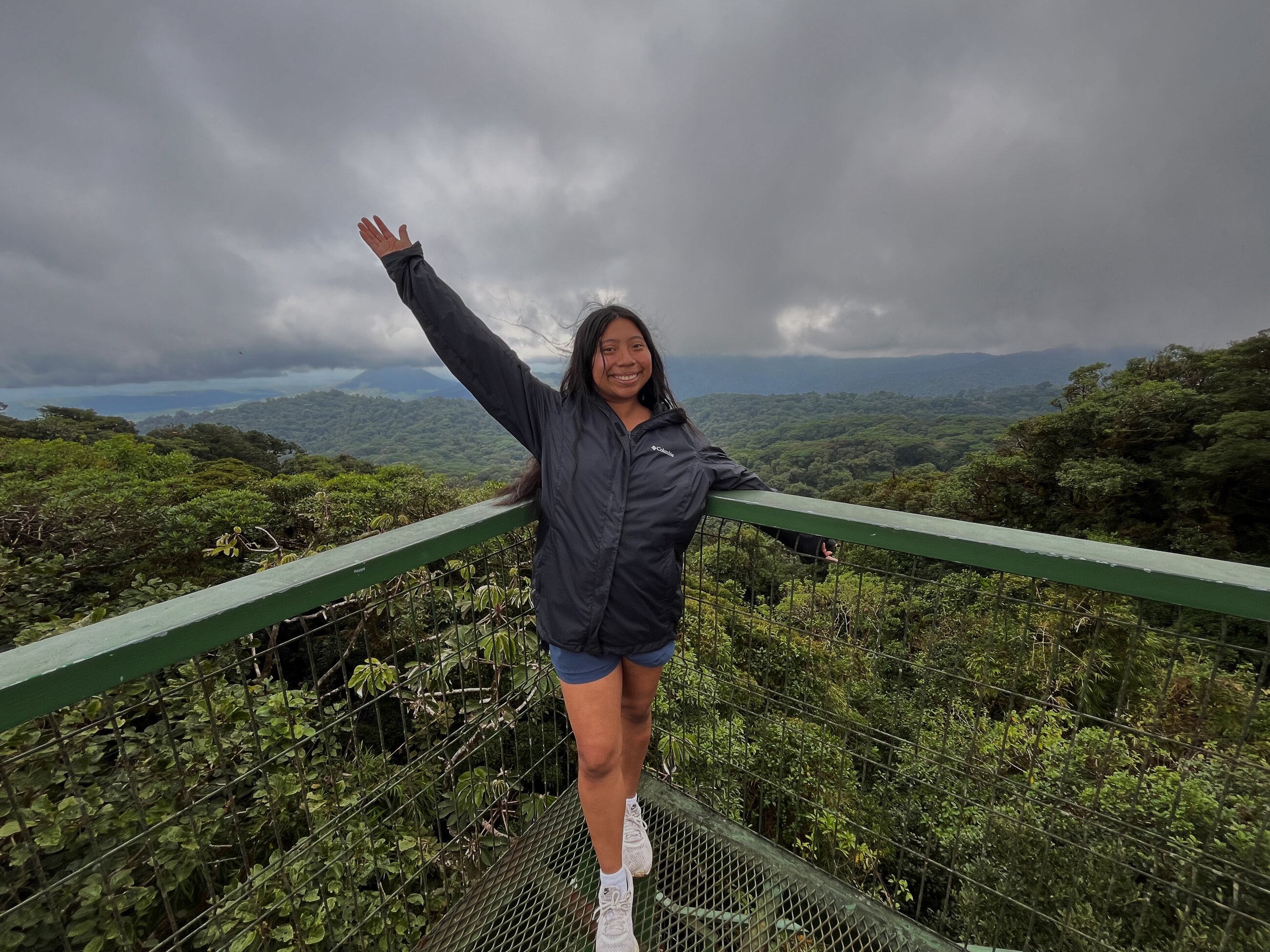 Taking a photo in front of Arenal Volcano