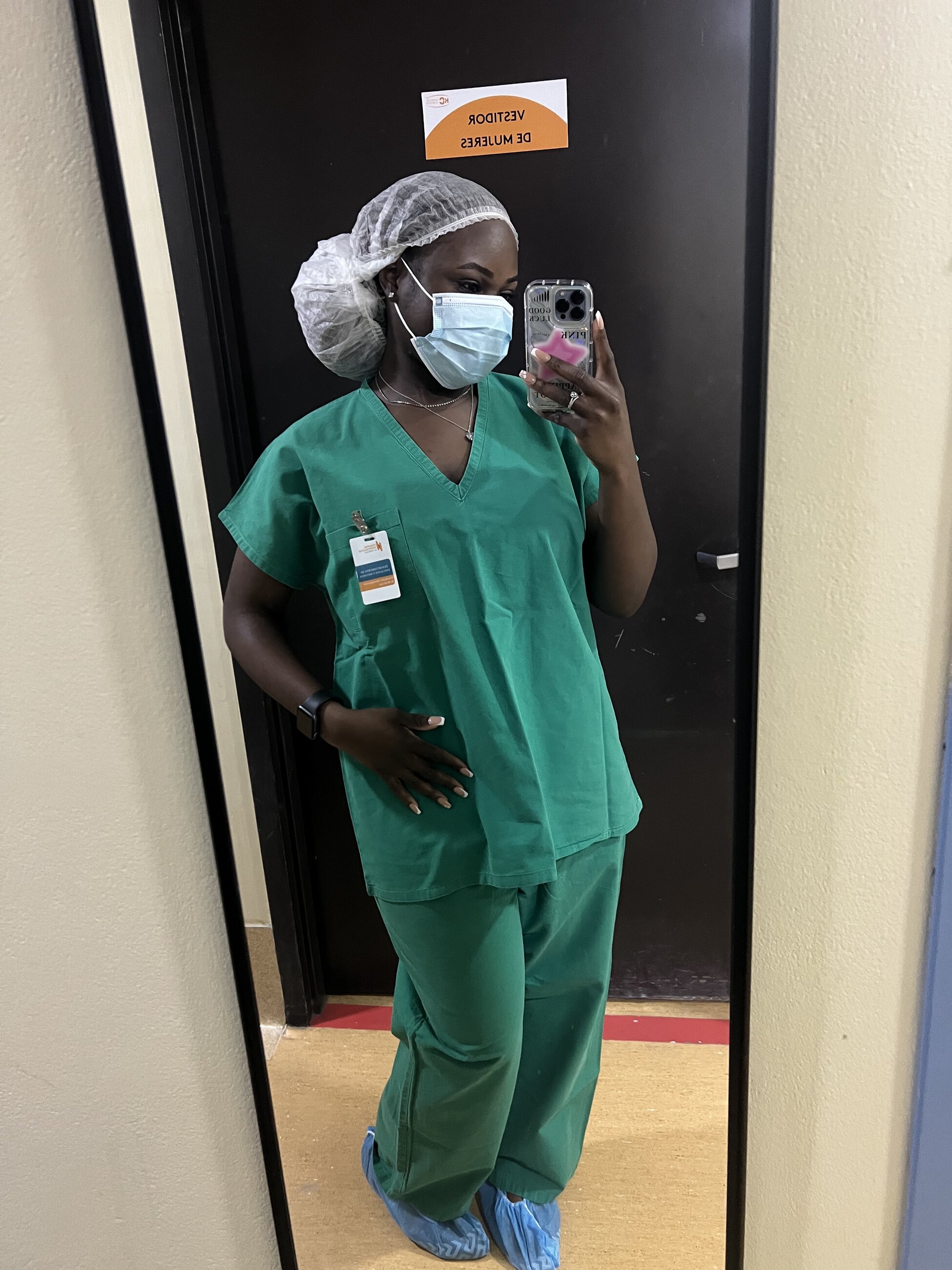 A picture of me before entering a public hospital's recovery room/ICU, where I shadowed physicians.