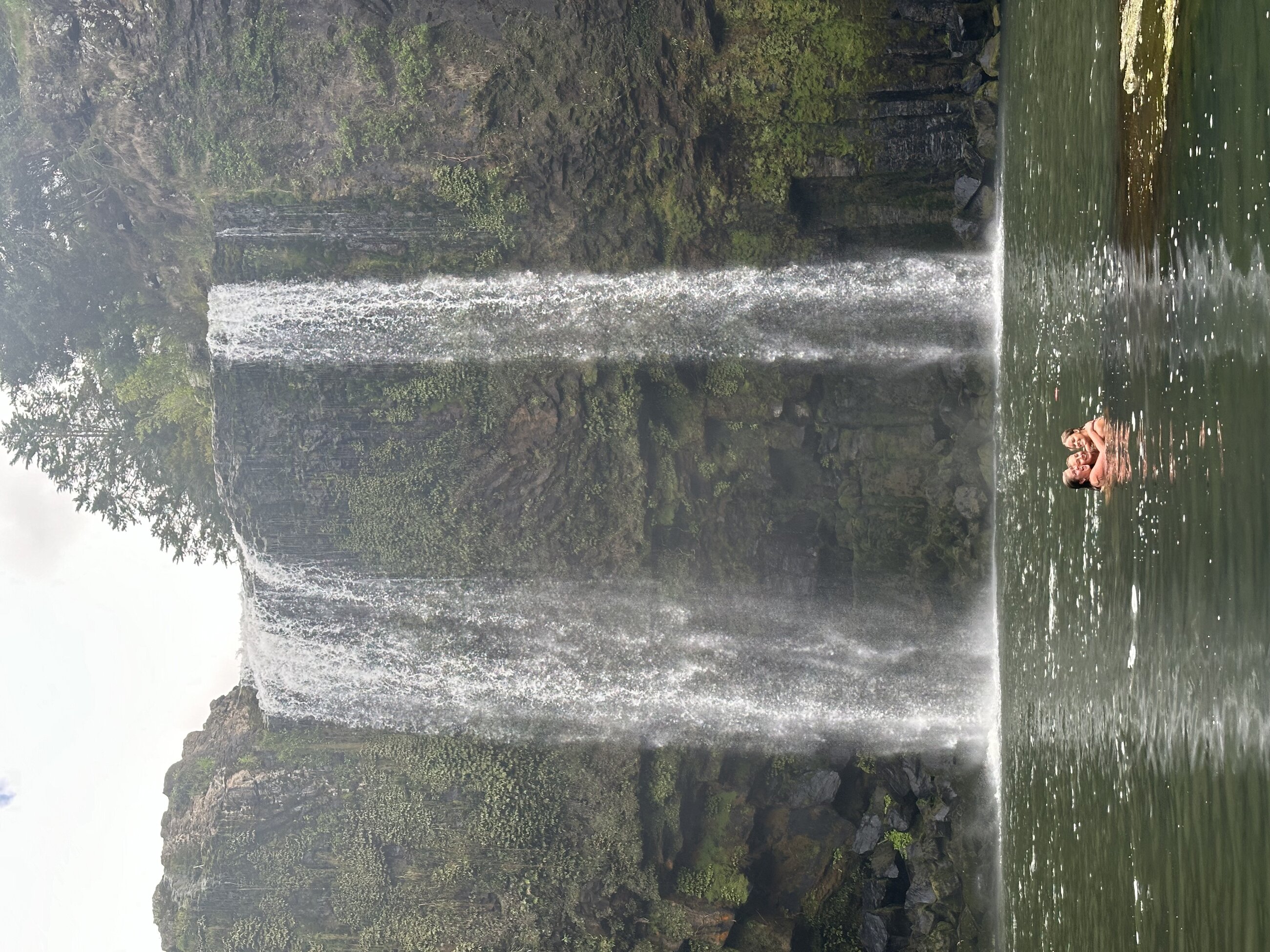 Swimming in a waterfall in New Zealand!