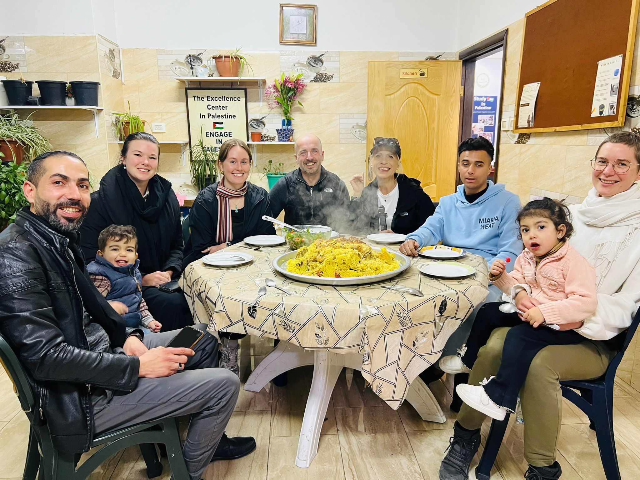 Malkluba at the center with friends