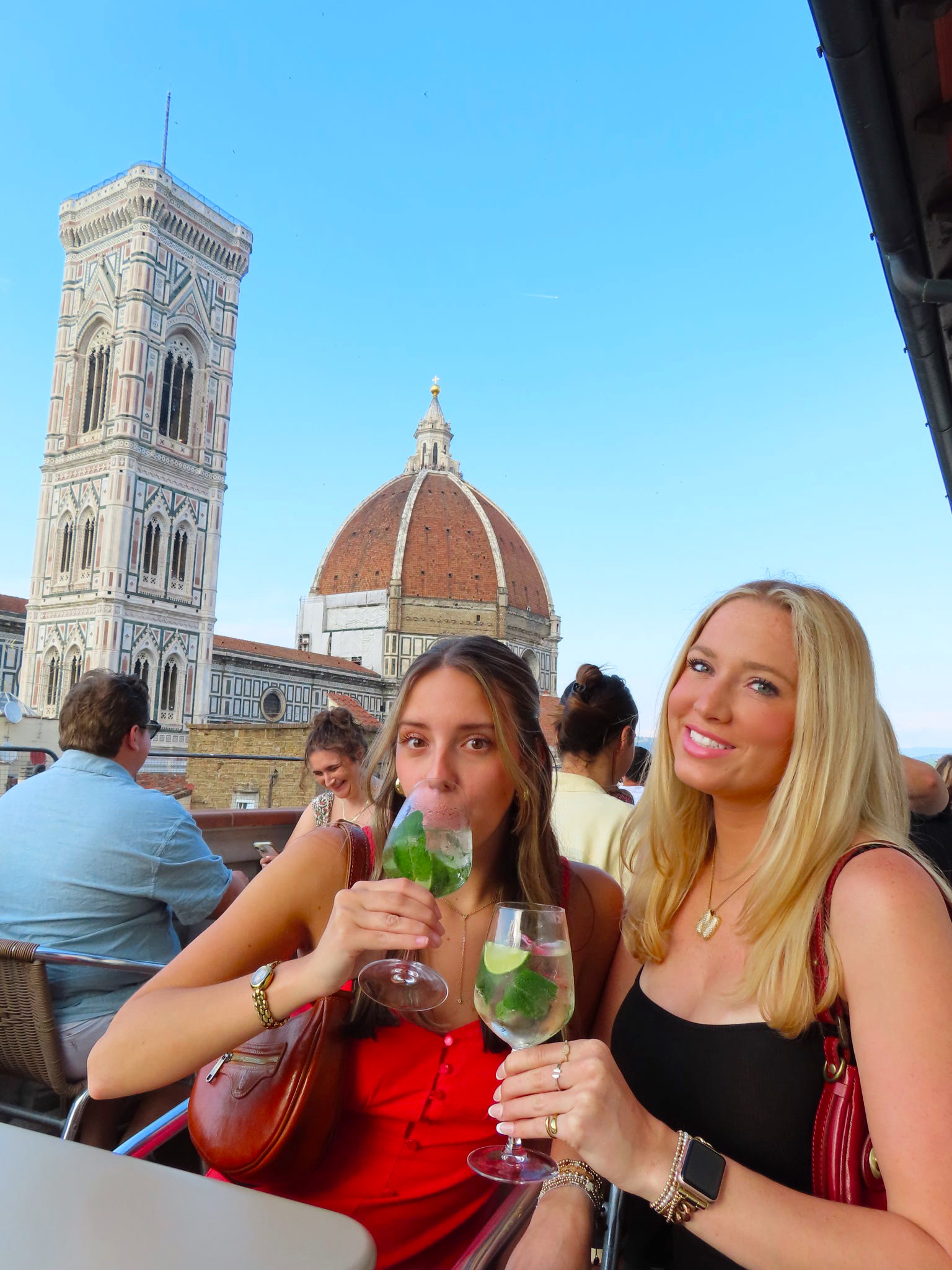 Drinks with my roomie at View on Art 🍹✨ Nothing better than spritzes and sunsets with the Duomo in the background!