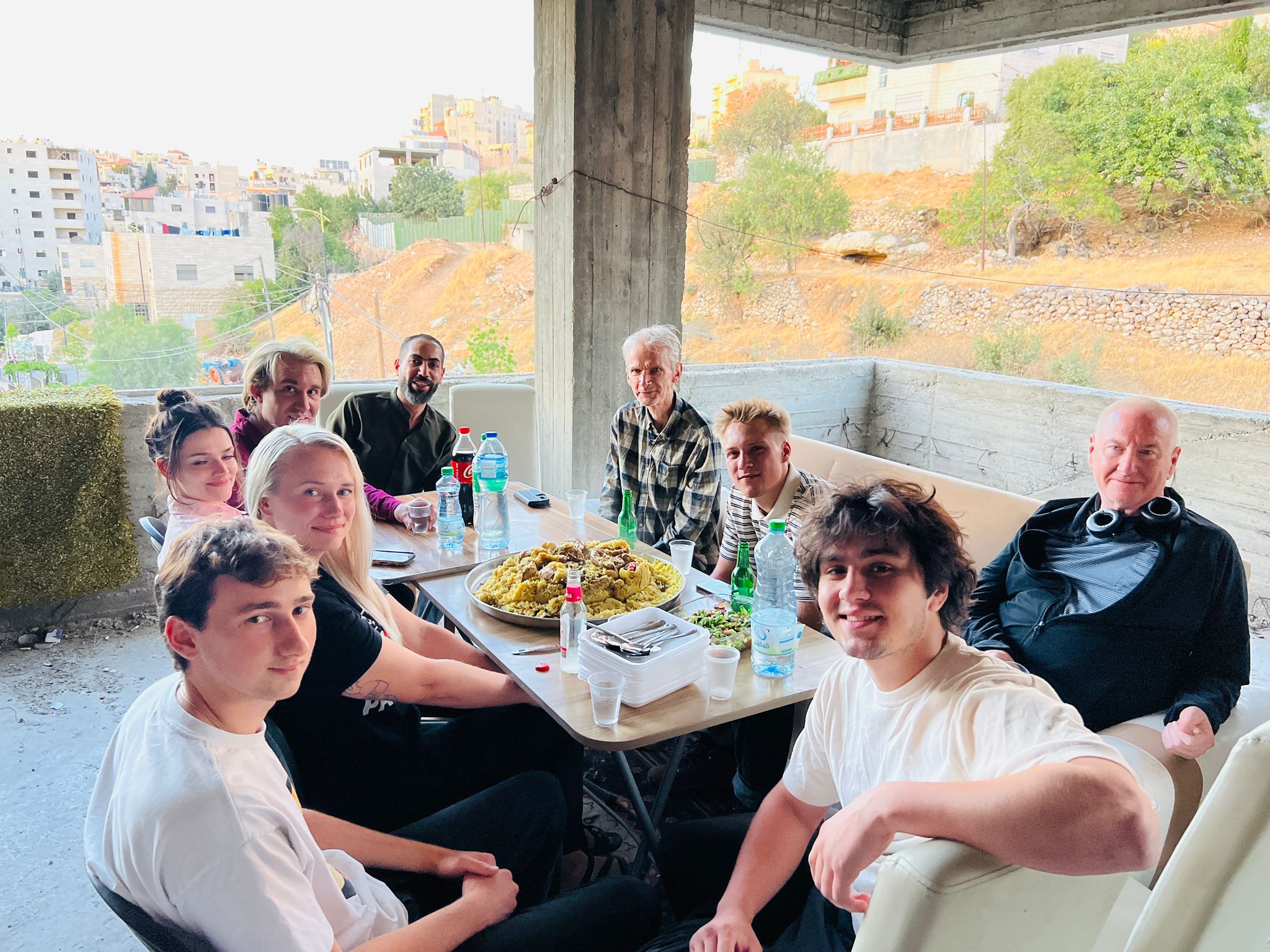 enjoying traditional Palestinian meal with the center