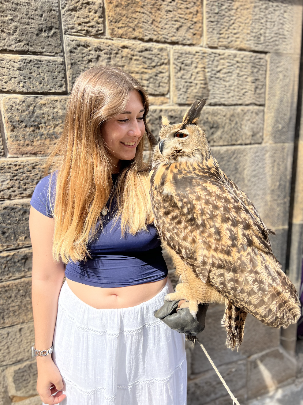Ainsley Braun holding an owl in Edinburgh, Scotland, May 2025 