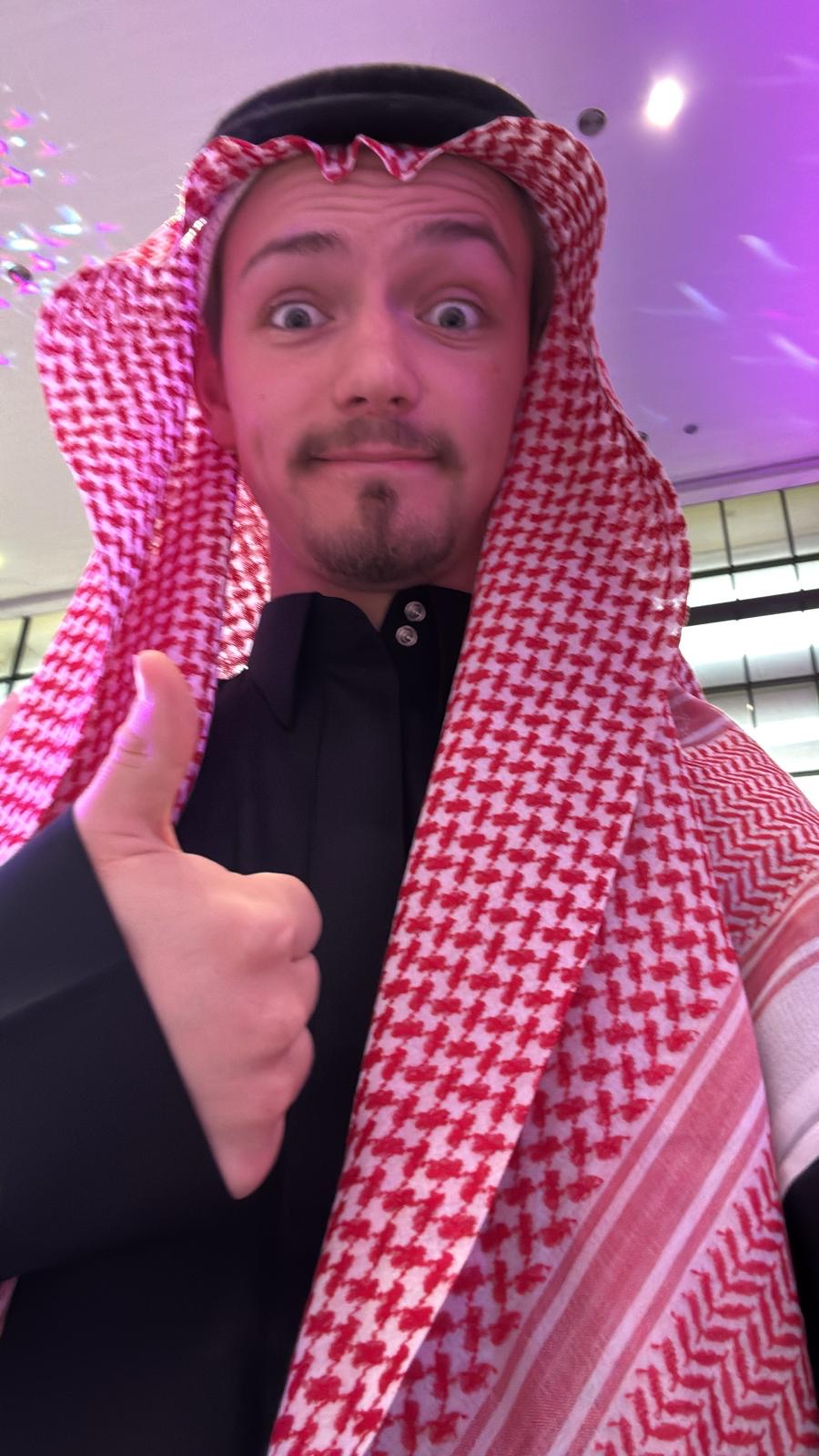 Me in traditional Saudi attire before speaking at a school hosted hackathon