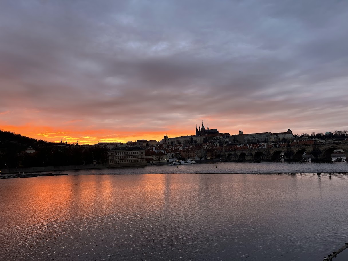Sunset above the Vltava River (palace in the distance)